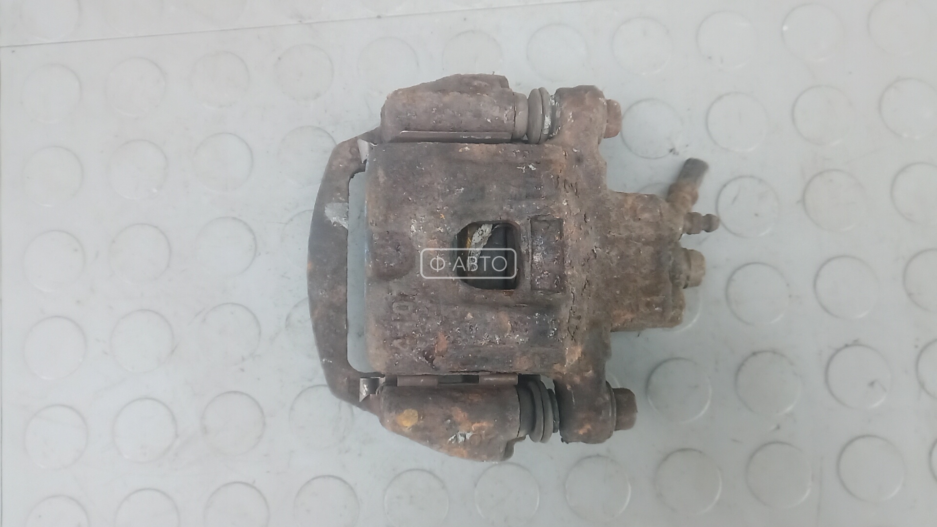 Суппорт тормозной задний левый