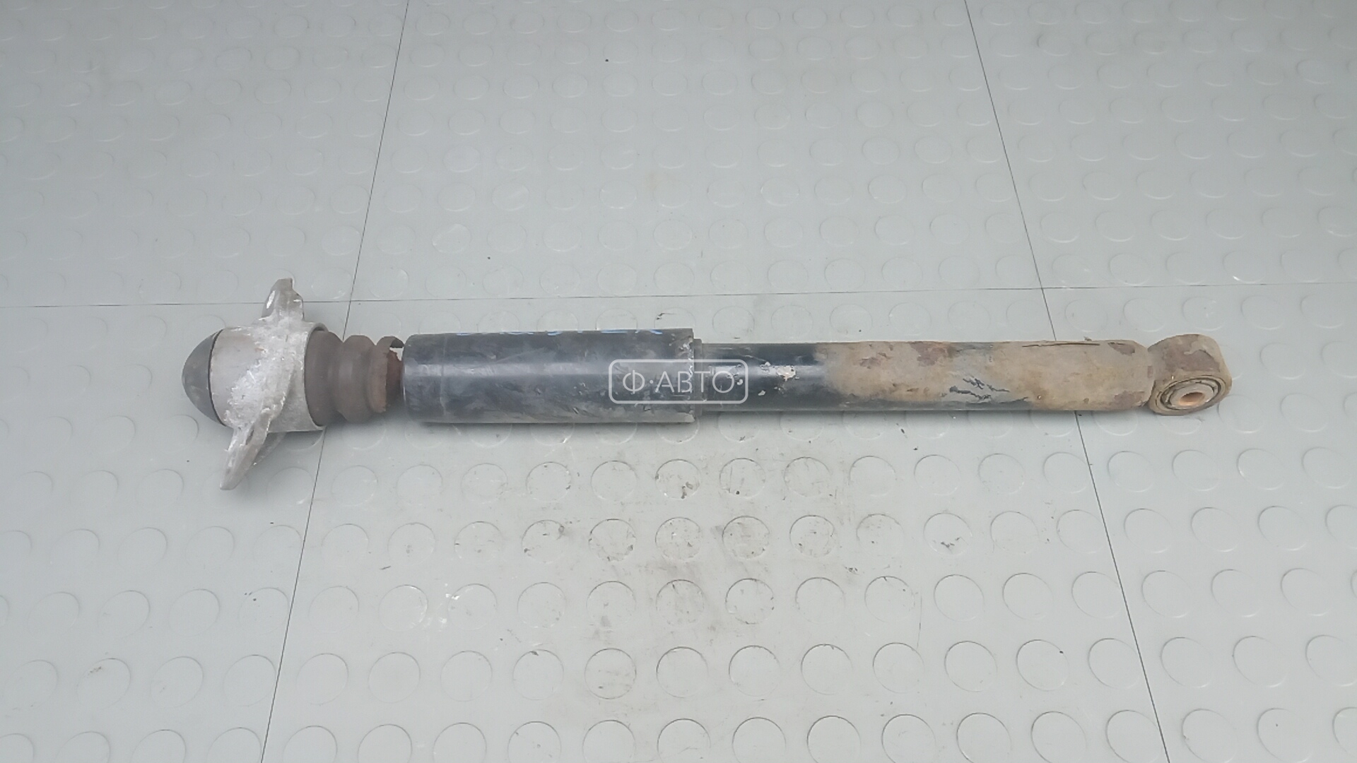 Амортизатор задней балки