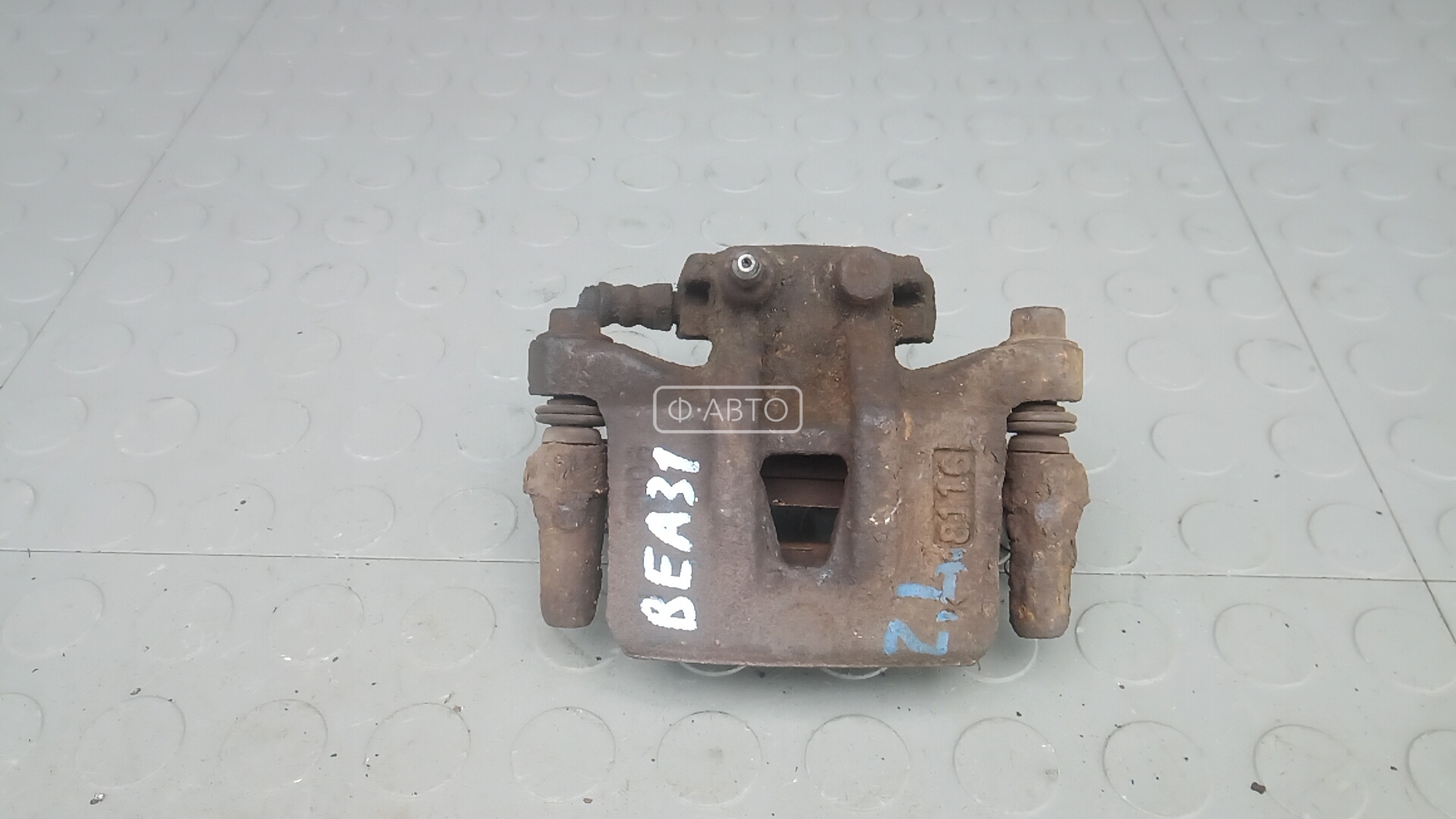 Суппорт тормозной задний левый