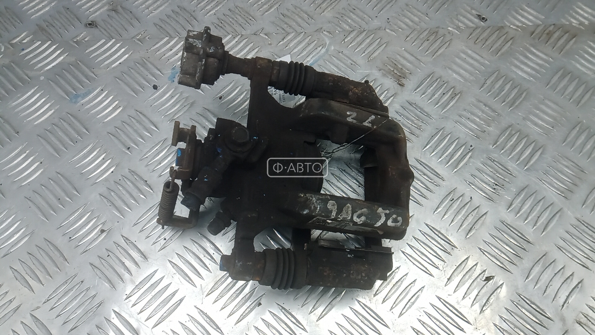 Суппорт тормозной задний левый