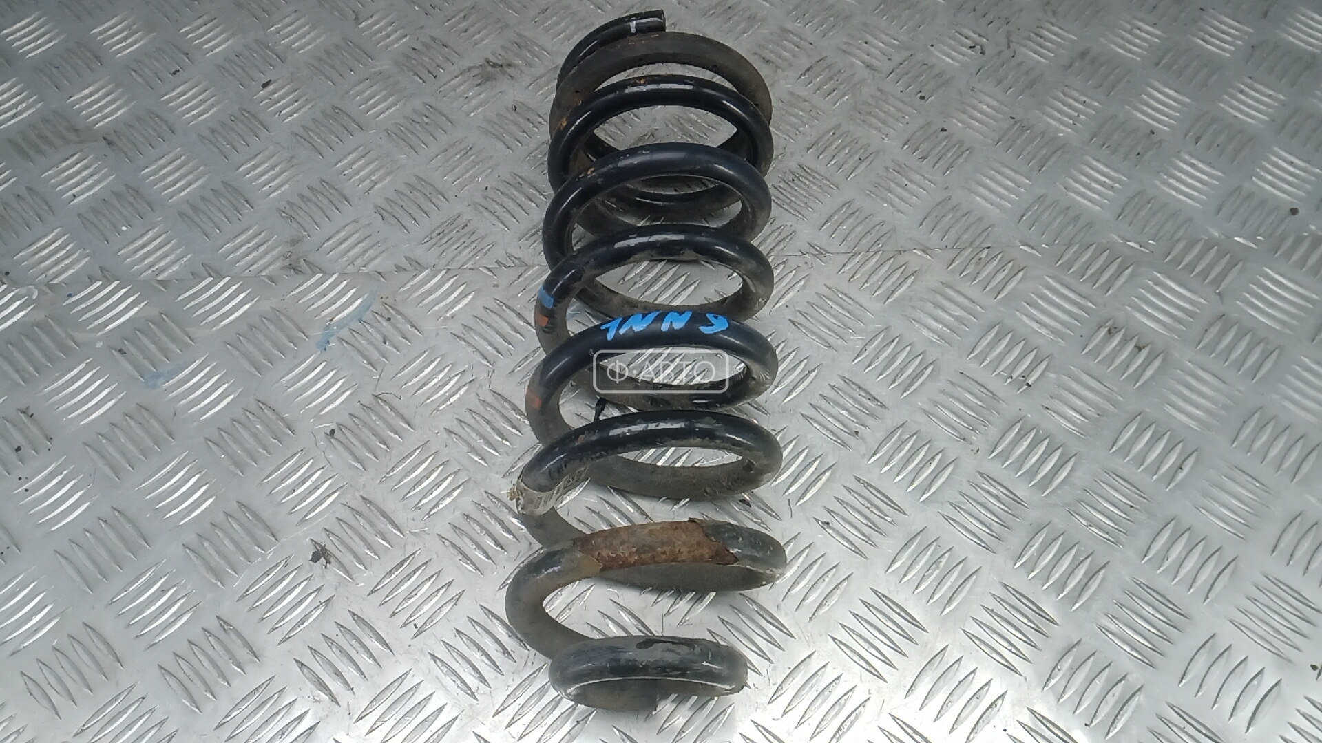 Пружина задняя