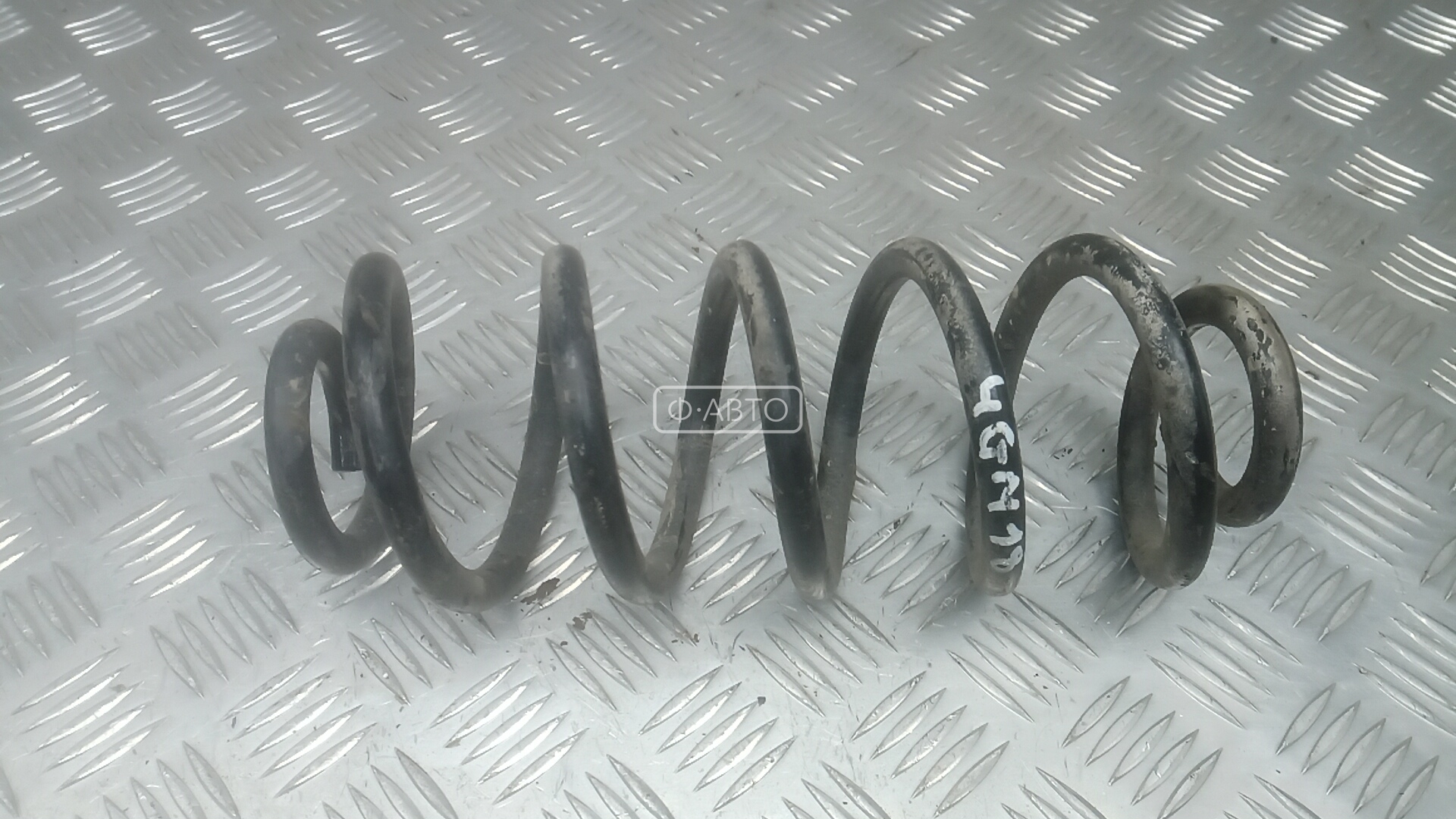 Пружина задняя