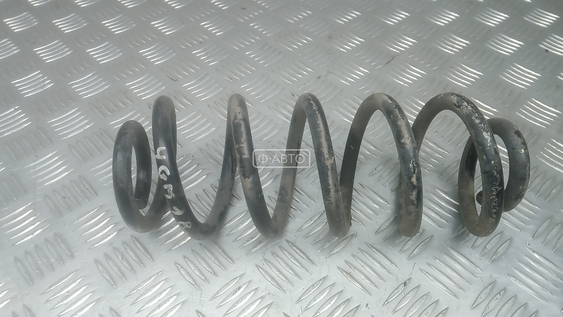 Пружина задняя