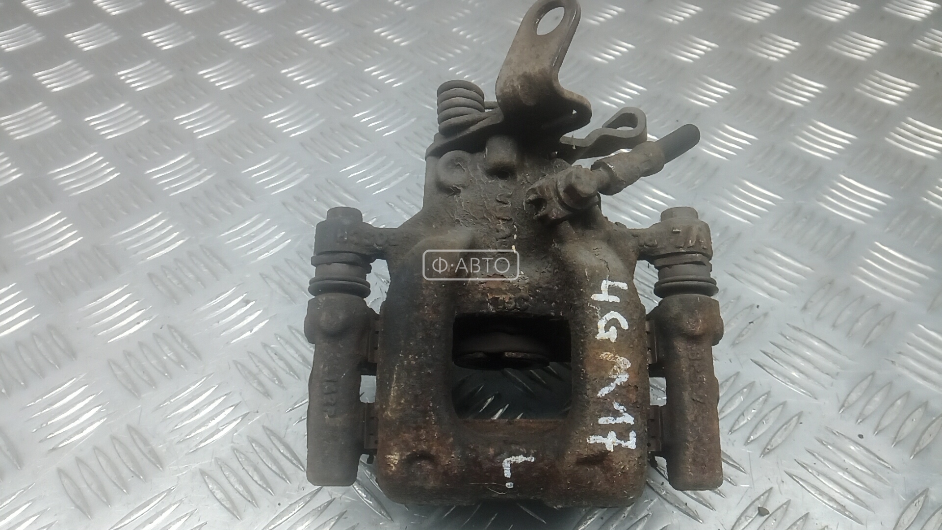 Суппорт тормозной задний левый