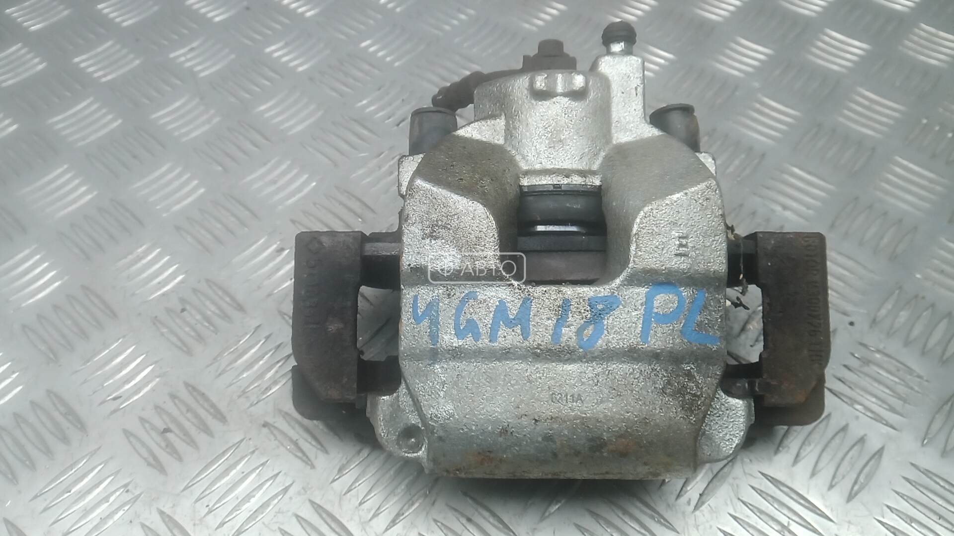 Суппорт тормозной передний левый