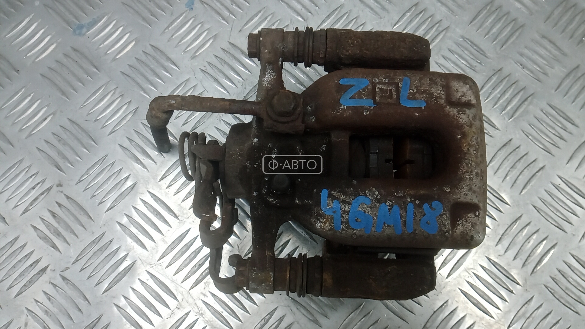 Суппорт тормозной задний левый