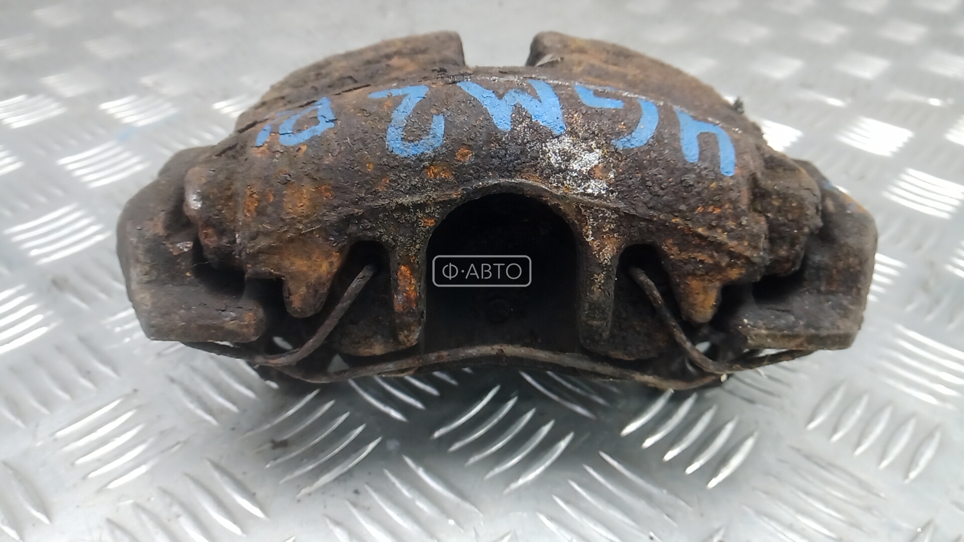 Суппорт тормозной передний левый