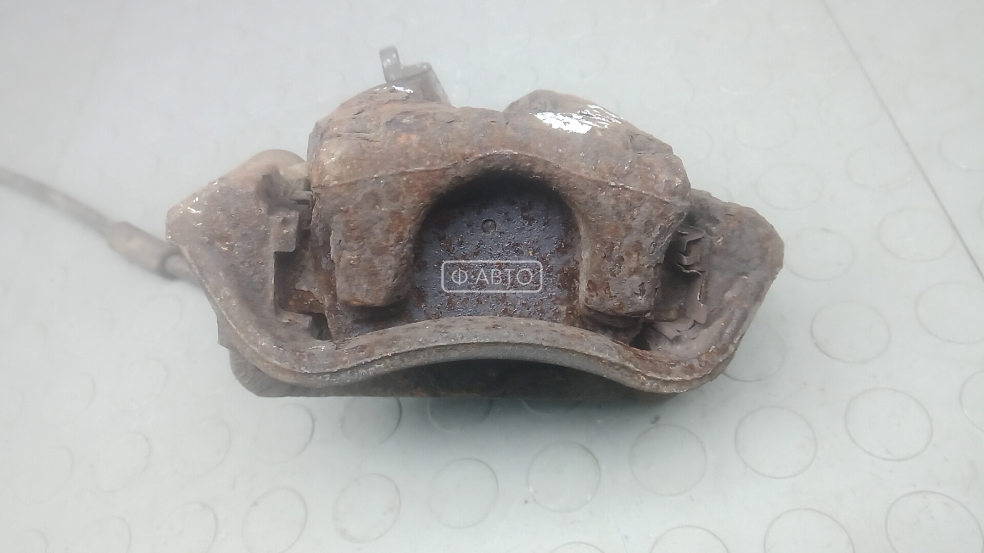 Суппорт тормозной задний левый