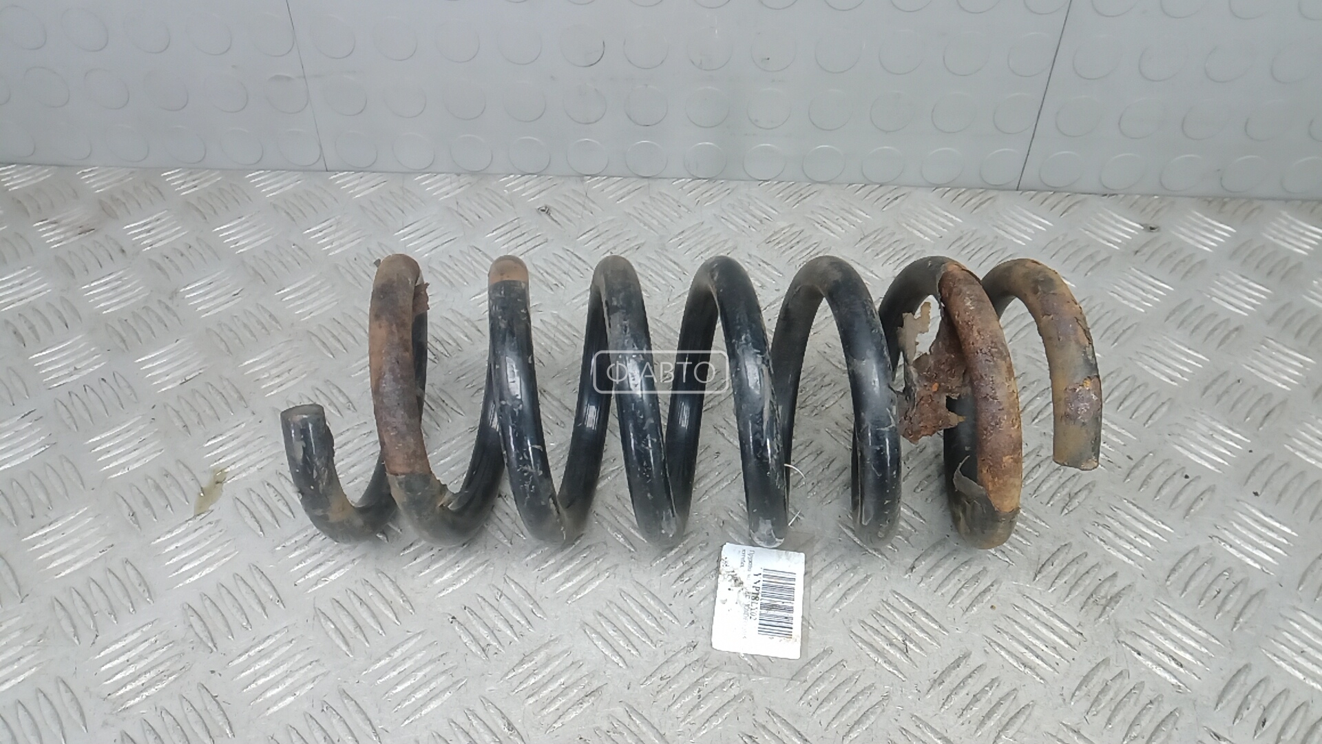 Пружина задняя