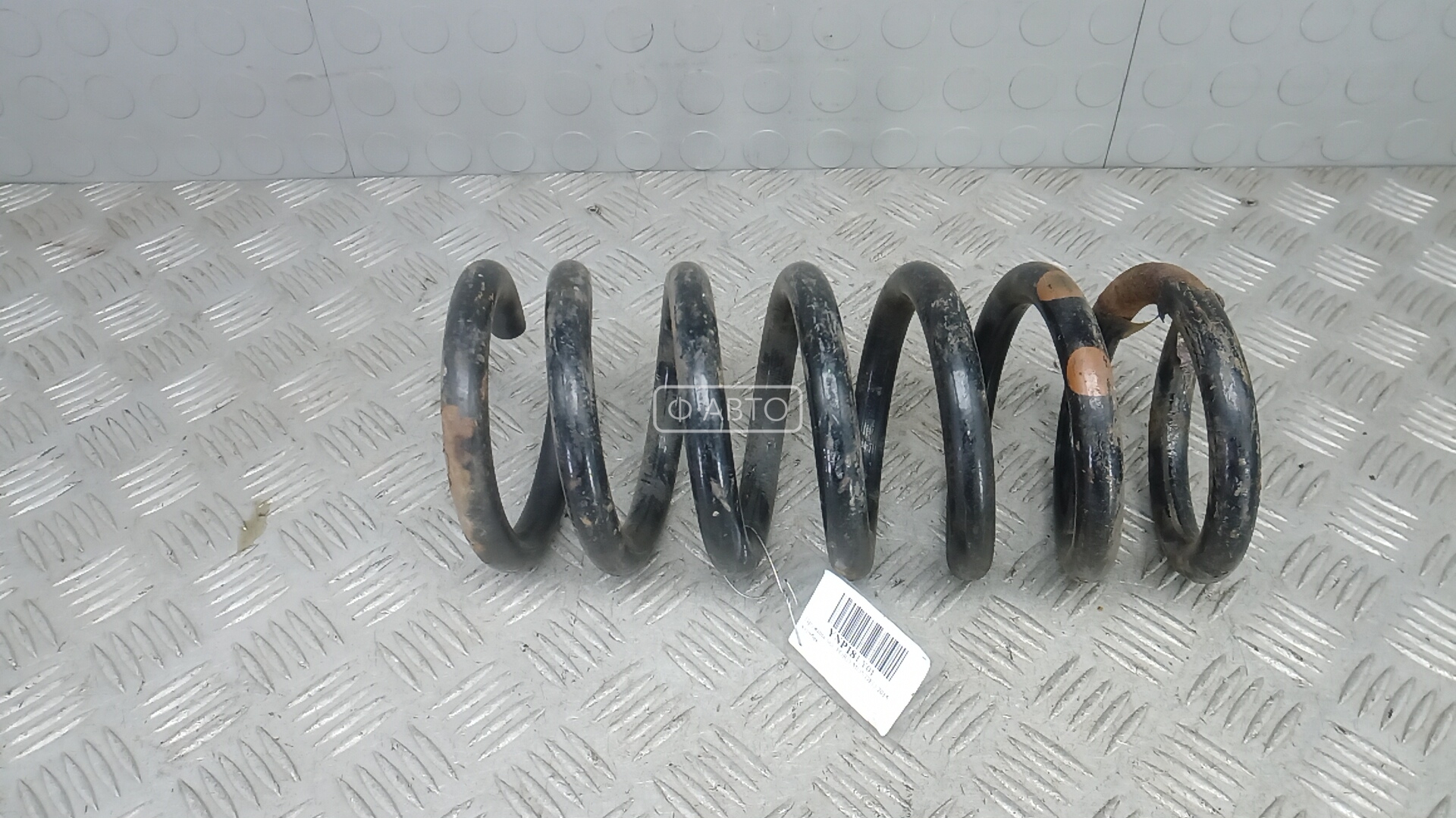 Пружина задняя