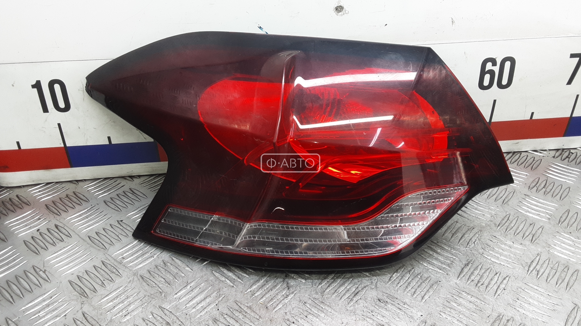 Фонарь задний левый