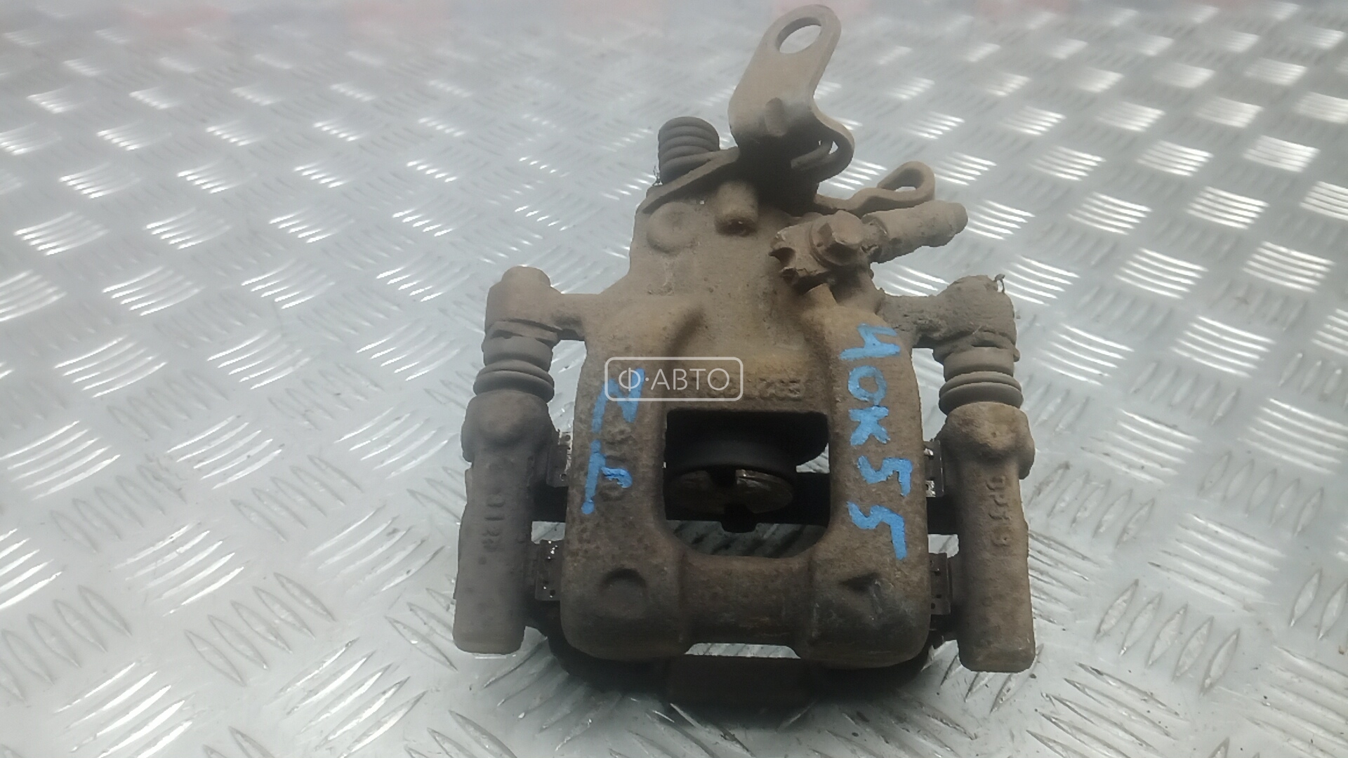 Суппорт тормозной задний левый