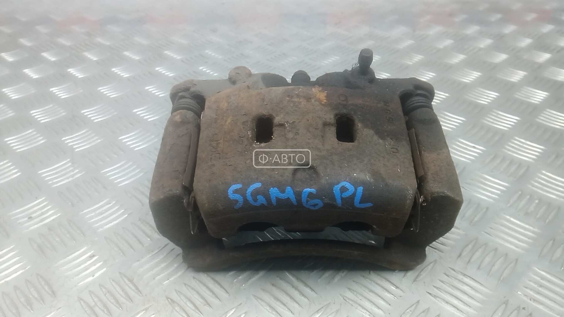 Суппорт тормозной передний левый