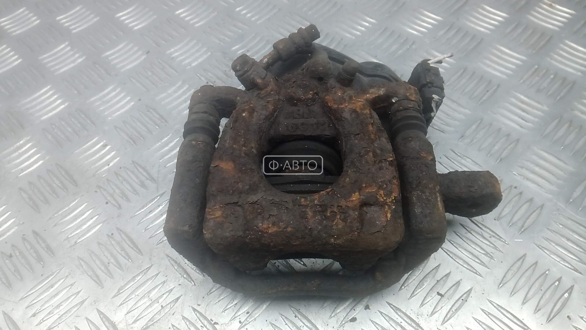 Суппорт тормозной задний правый