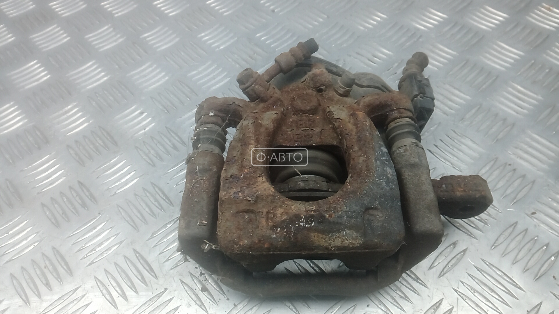 Суппорт тормозной задний правый