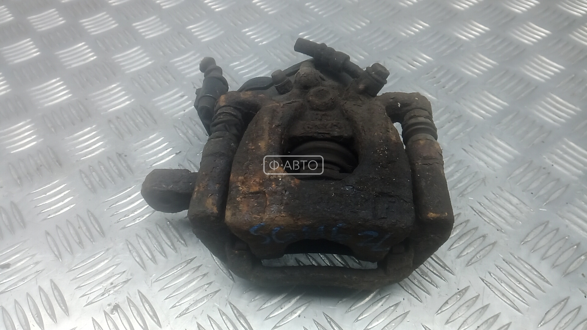 Суппорт тормозной задний левый