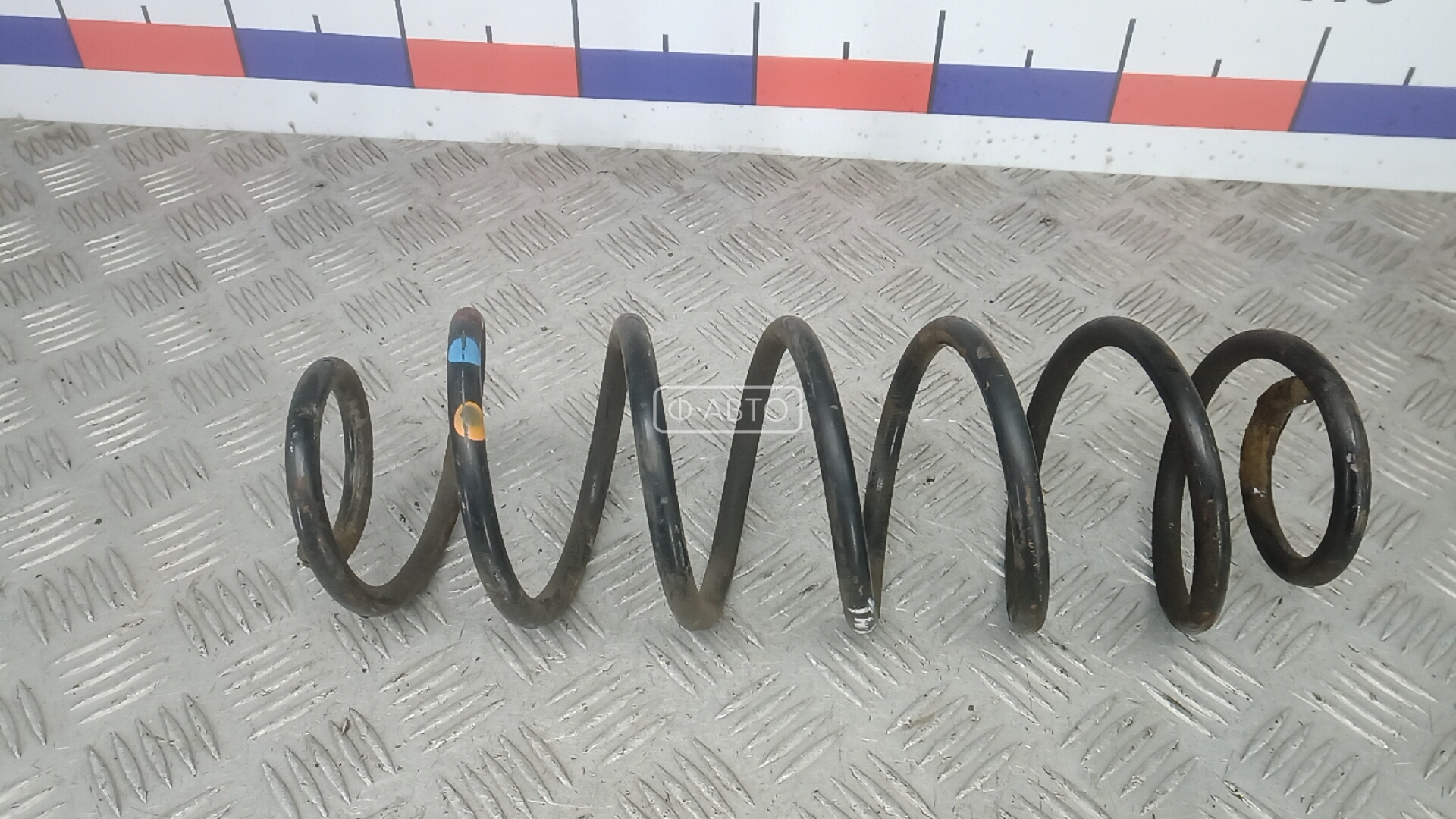 Пружина задняя