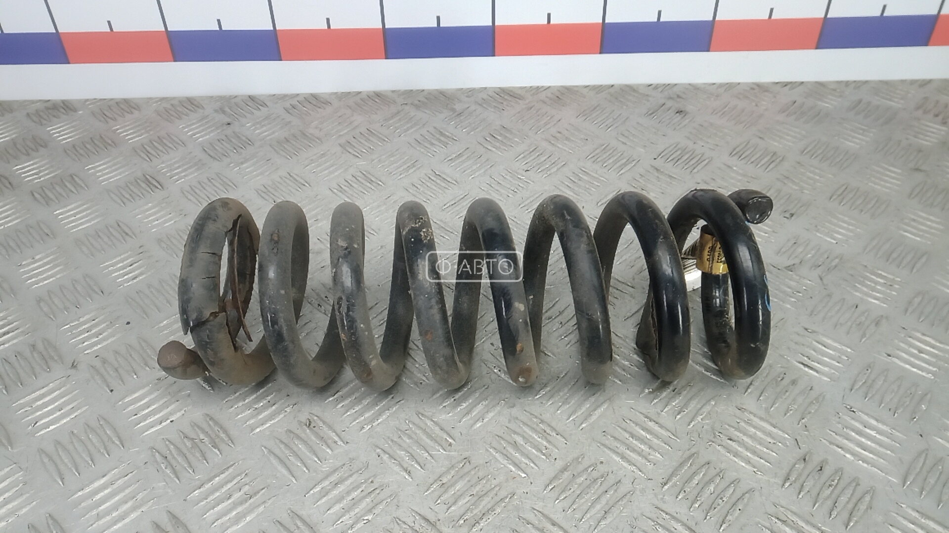 Пружина задняя