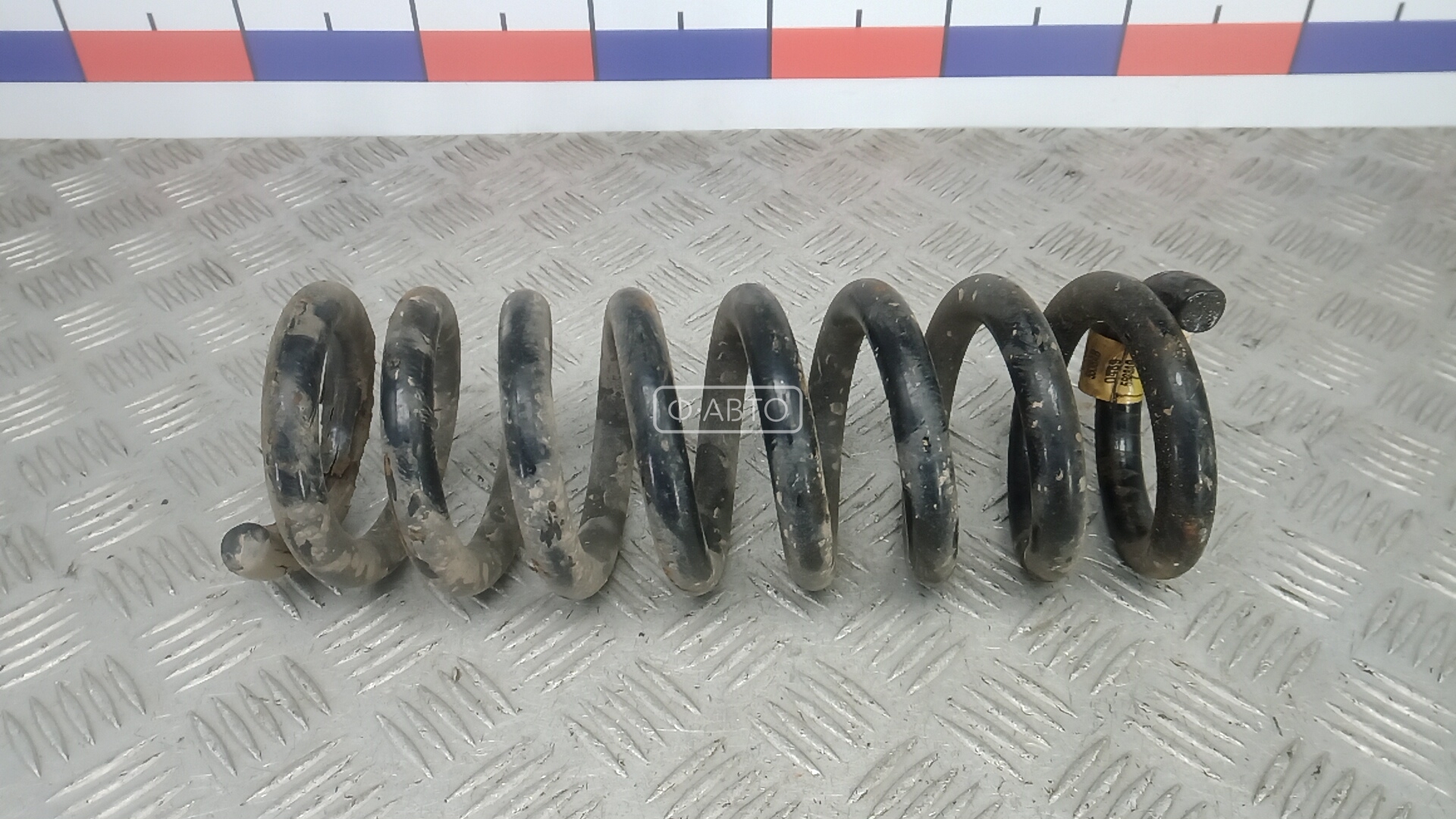 Пружина задняя