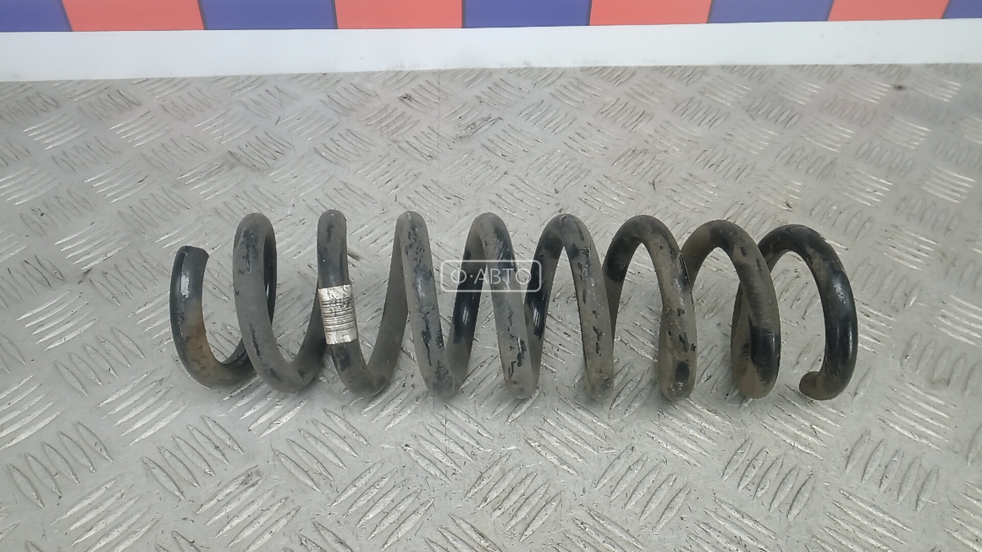 Пружина задняя