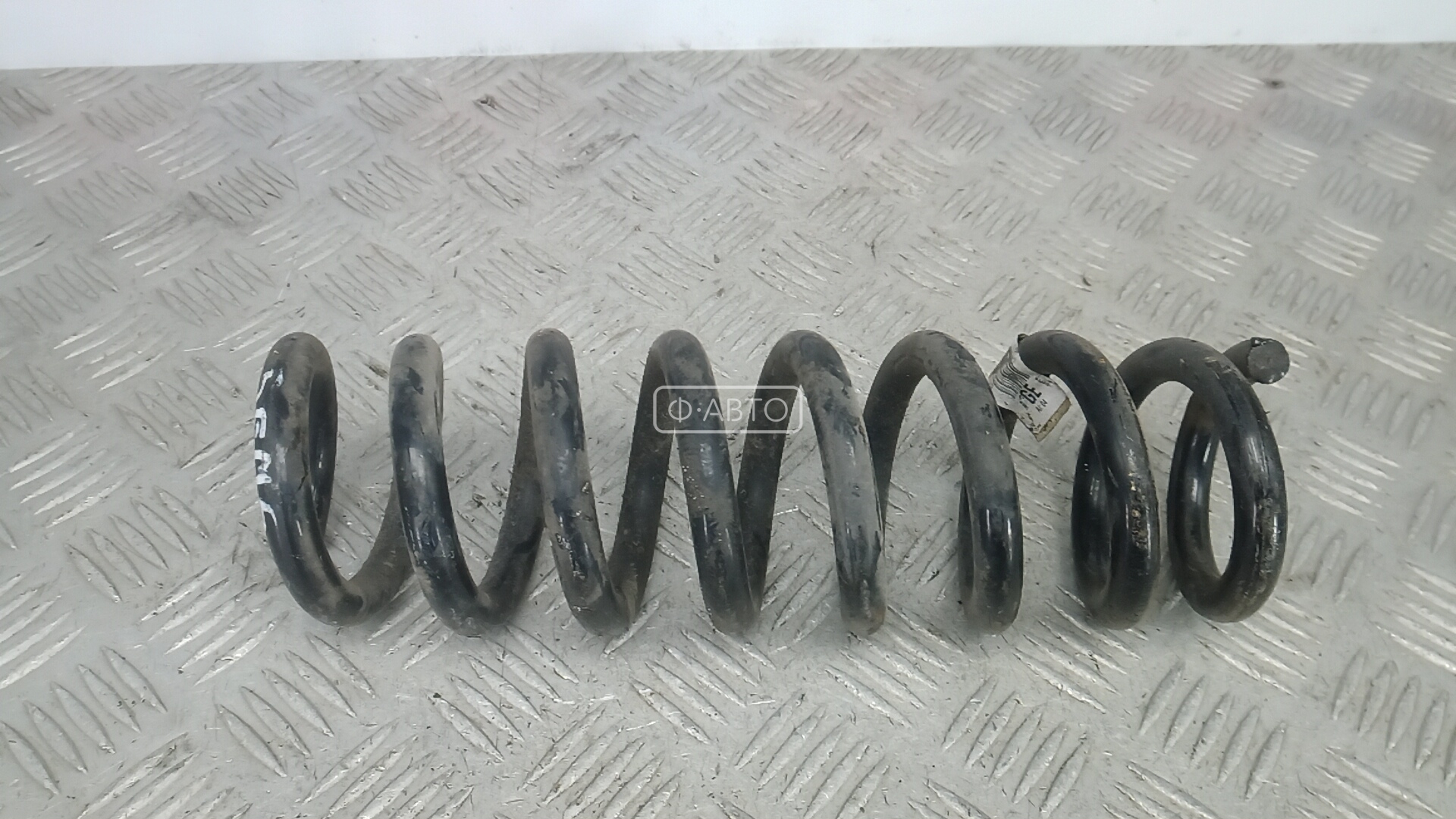 Пружина задняя