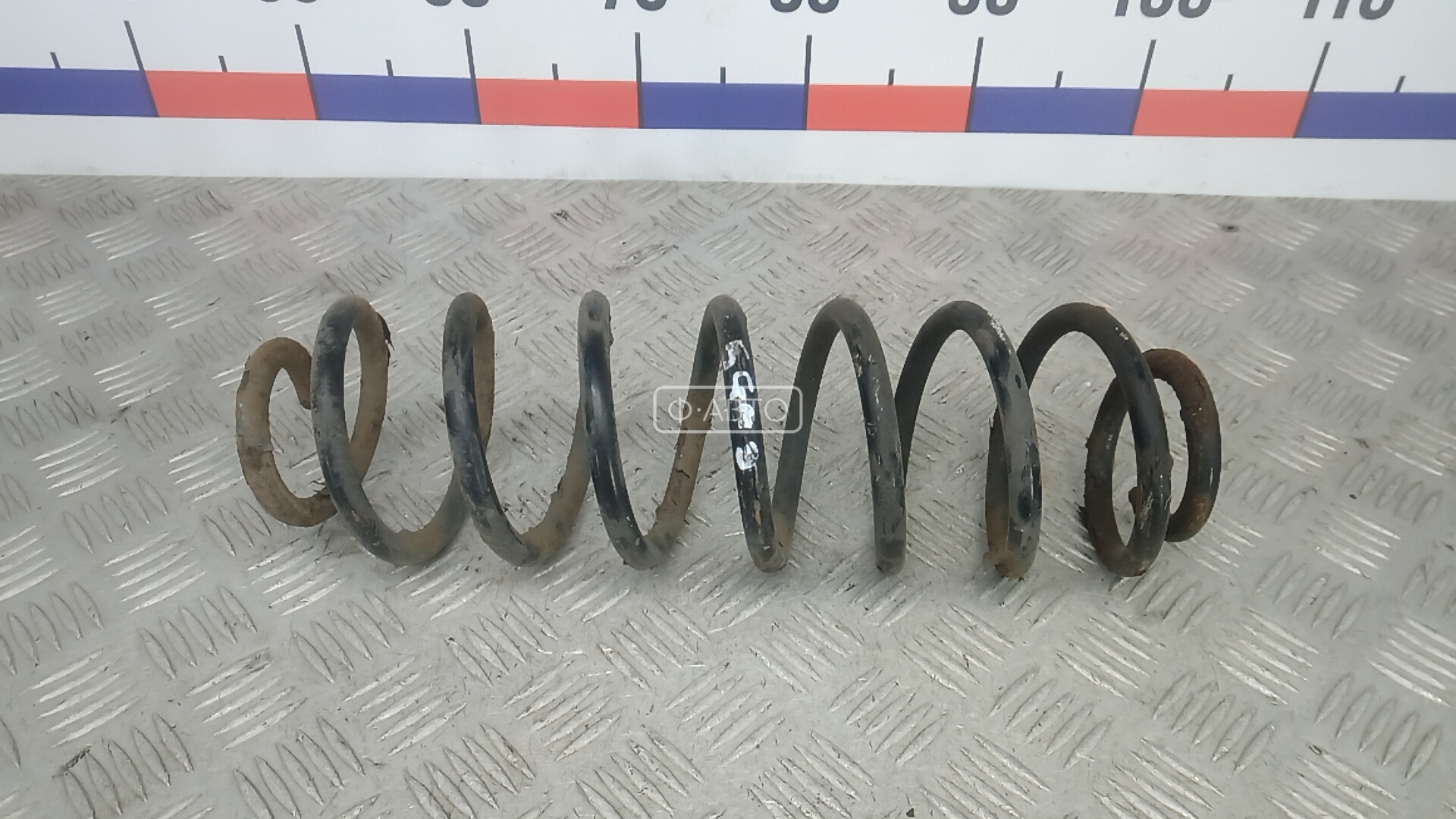 Пружина задняя