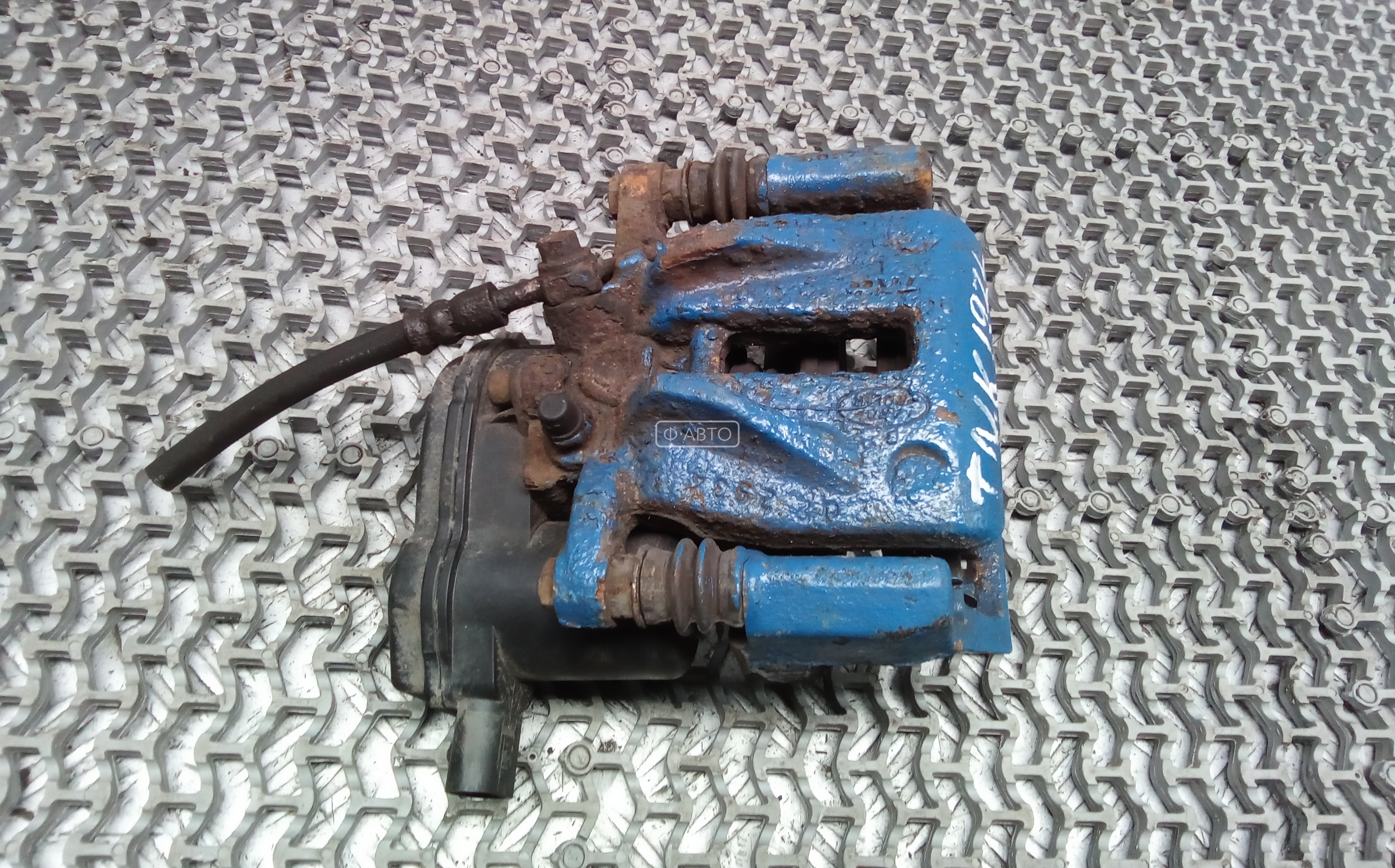 Суппорт тормозной задний левый