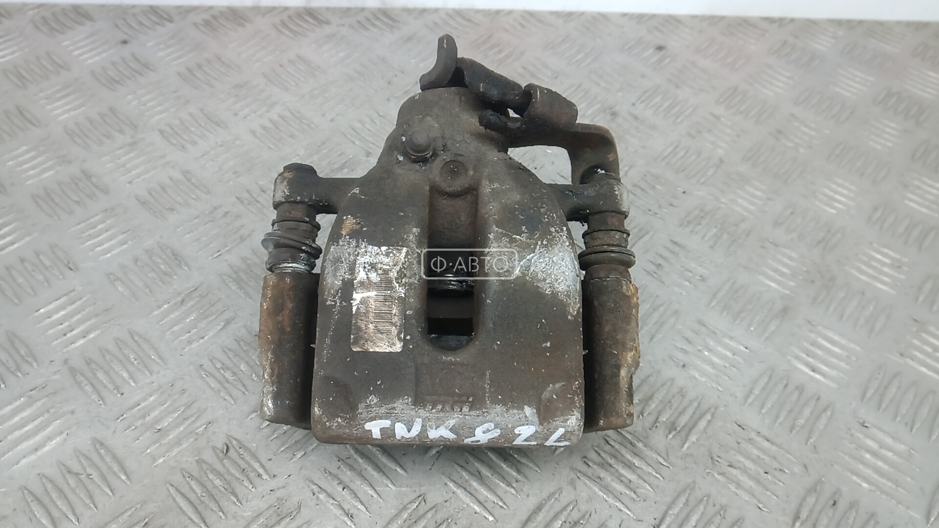 Суппорт тормозной задний левый