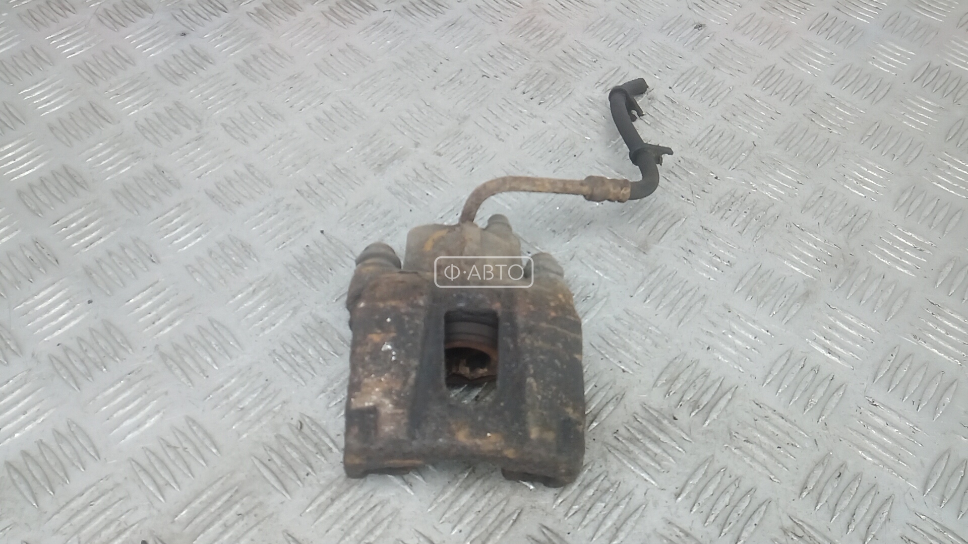 Суппорт тормозной задний левый