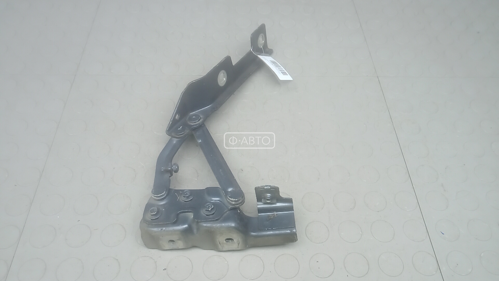 Петля капота