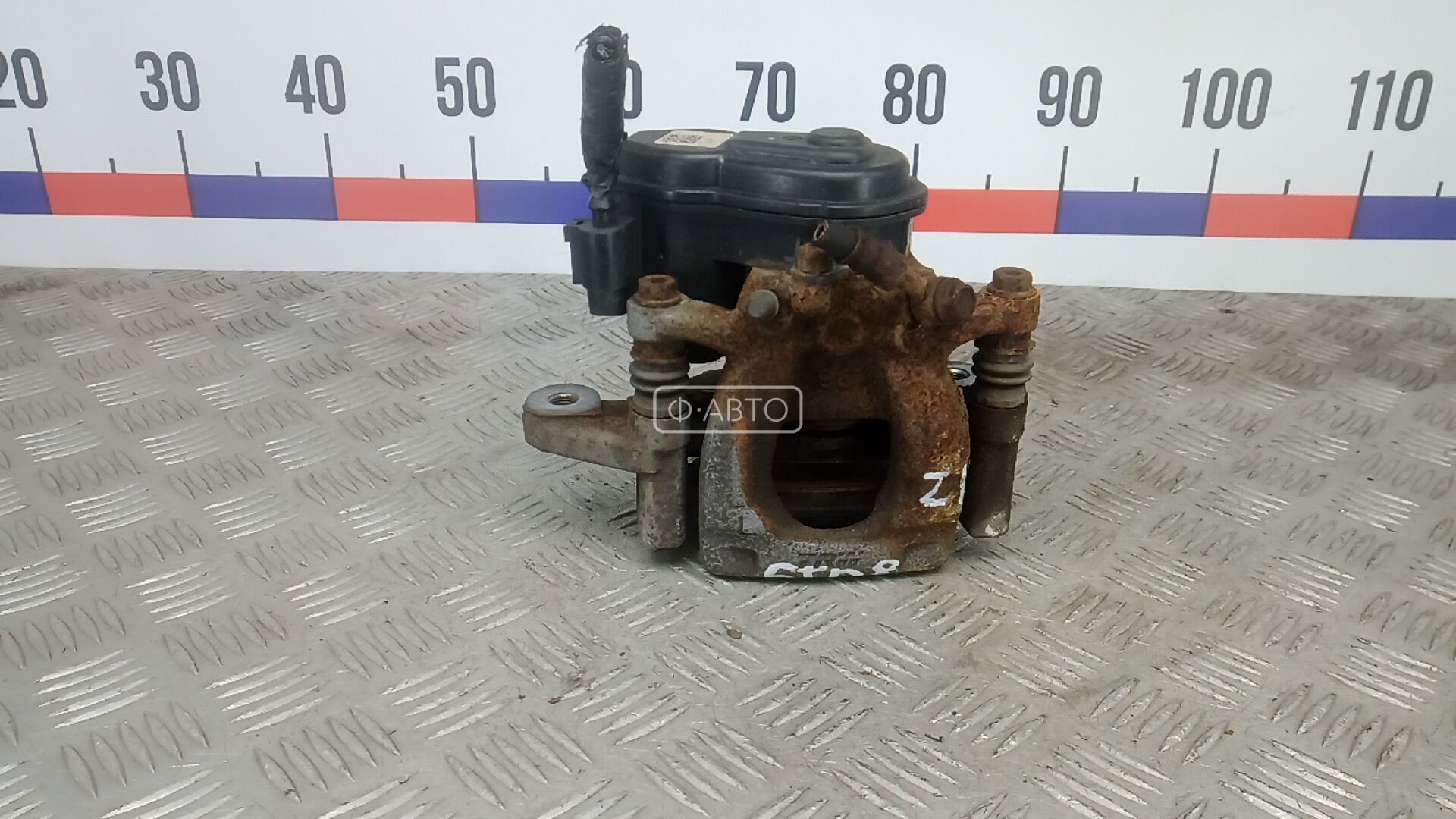 Суппорт тормозной задний левый