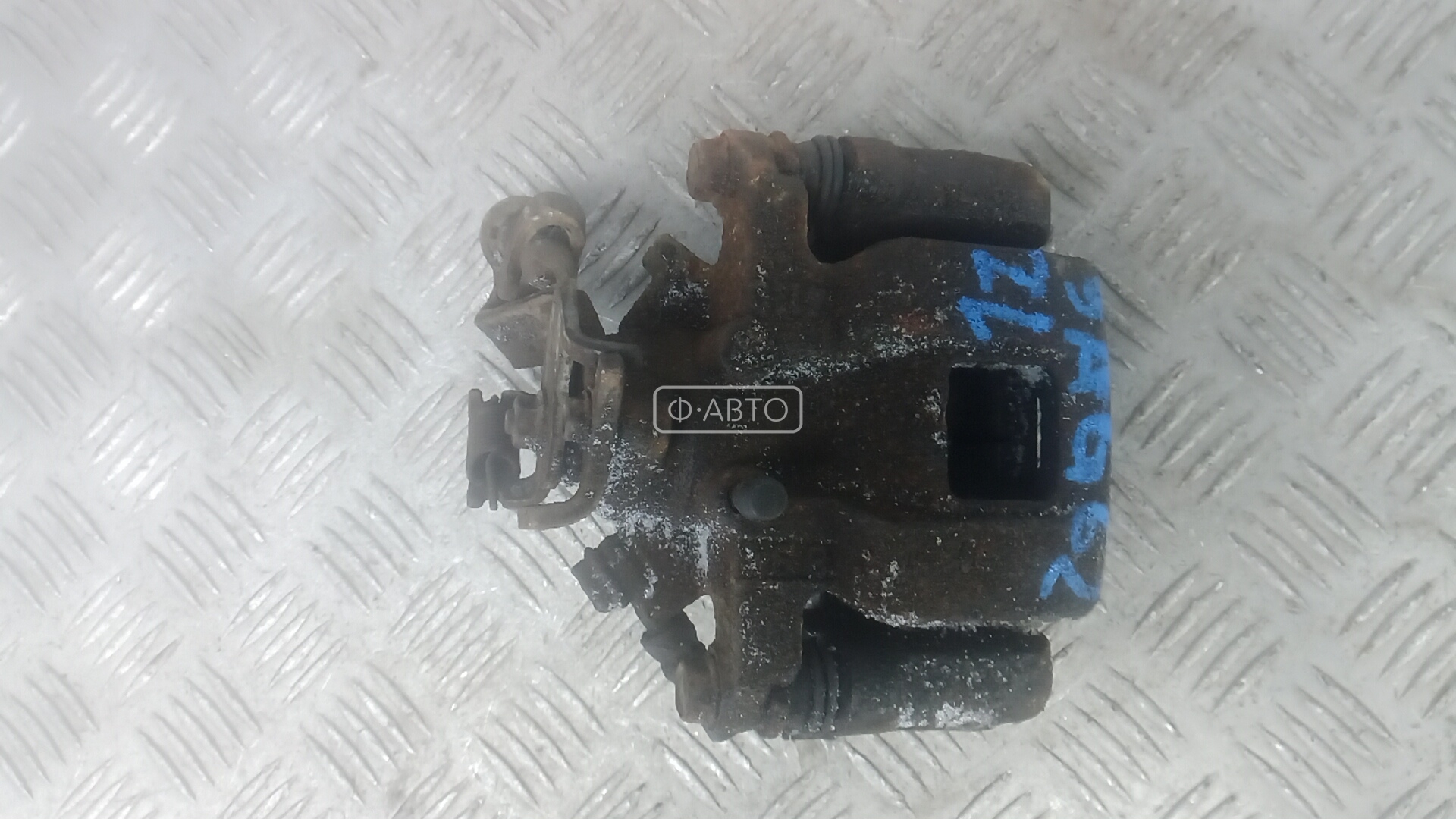 Суппорт тормозной задний левый