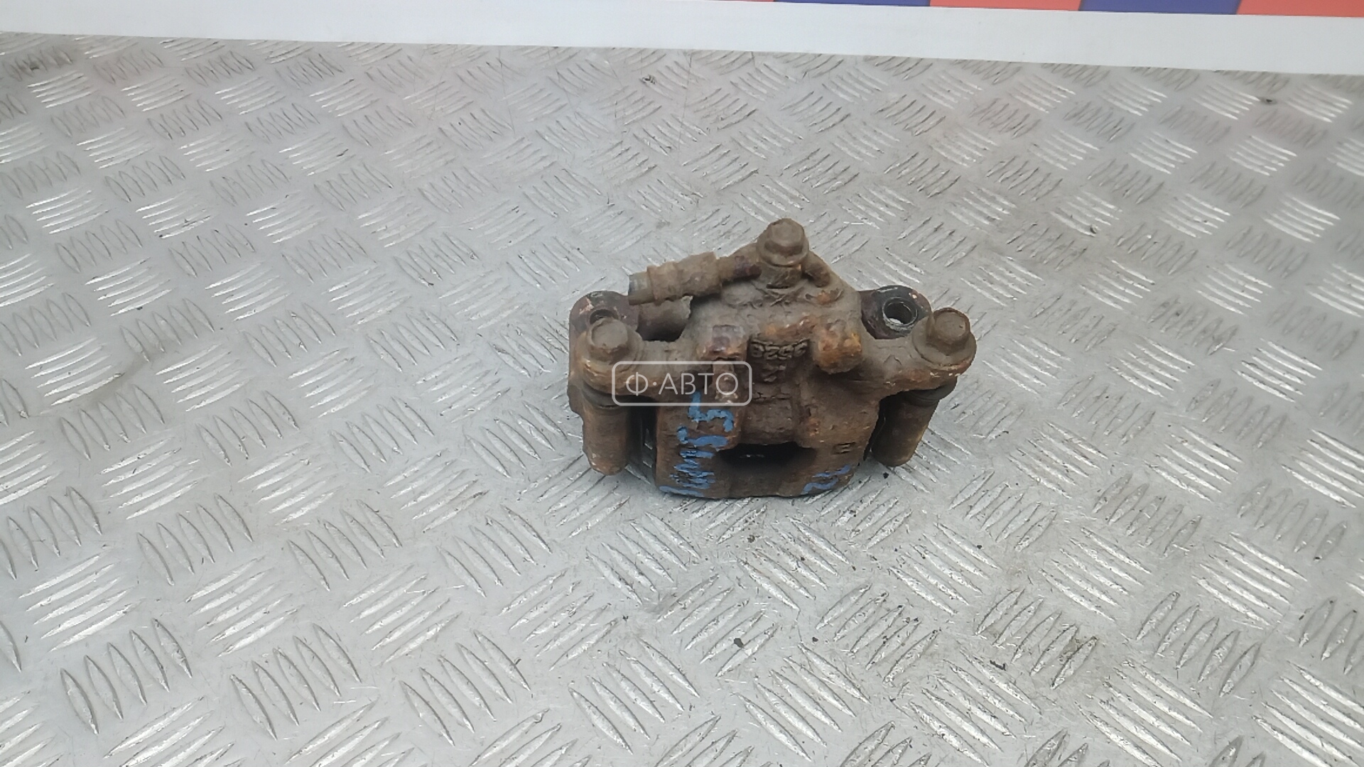 Суппорт тормозной задний левый