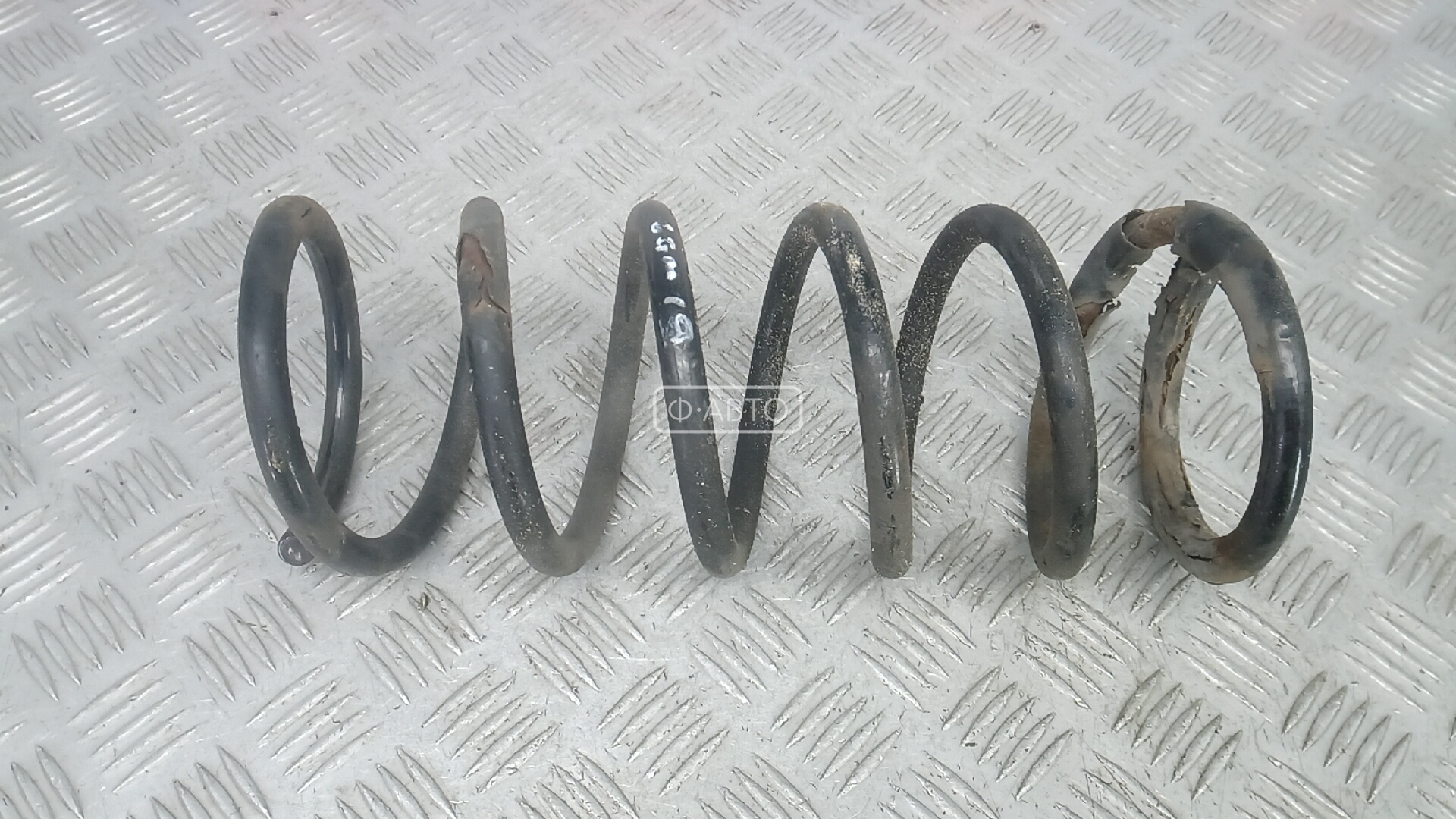 Пружина задняя