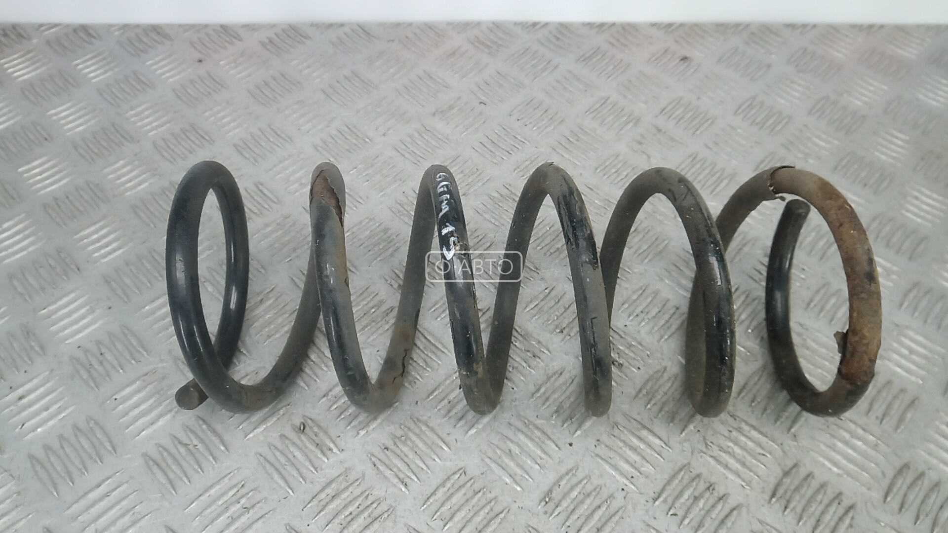 Пружина задняя