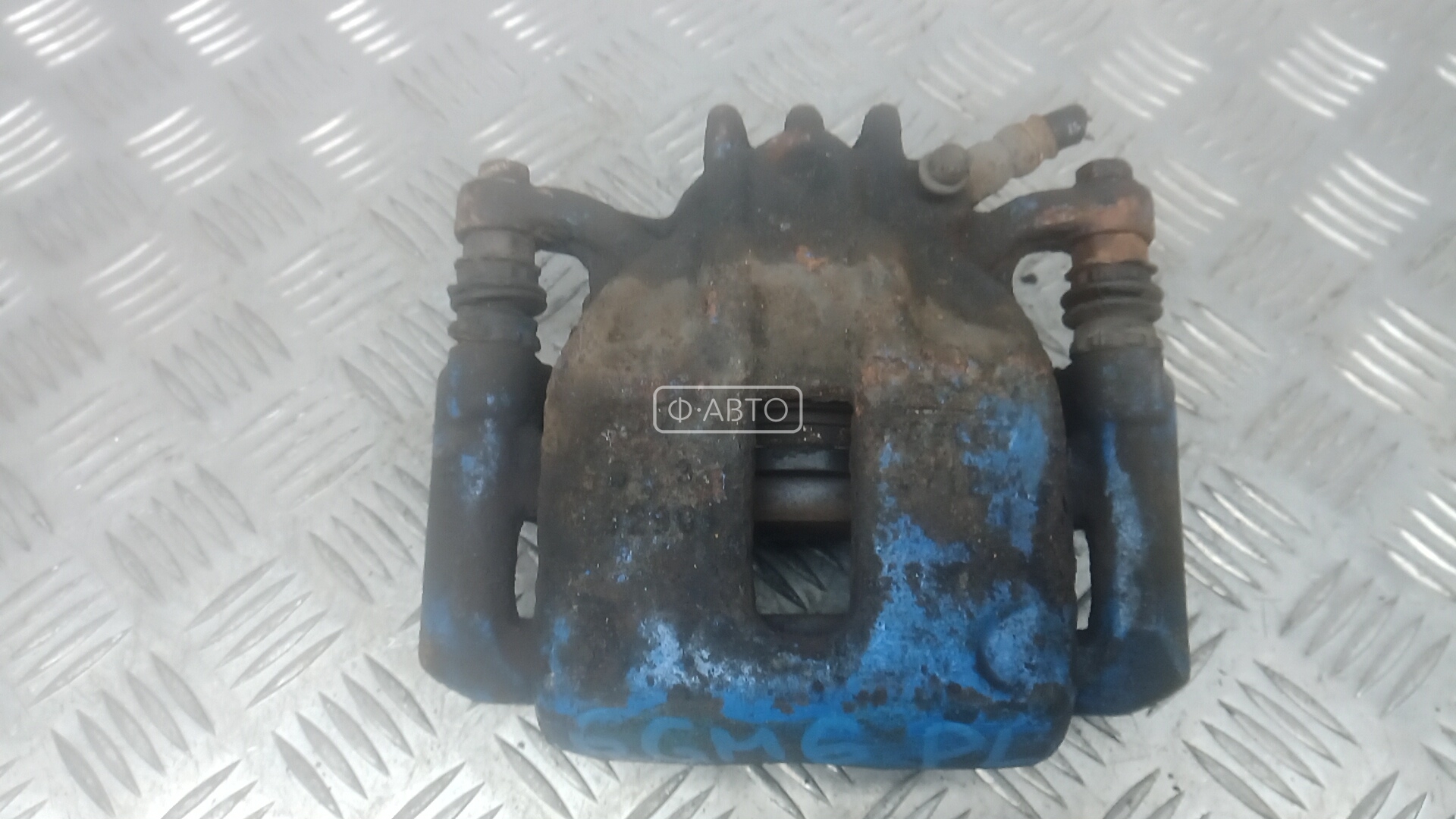 Суппорт тормозной передний левый