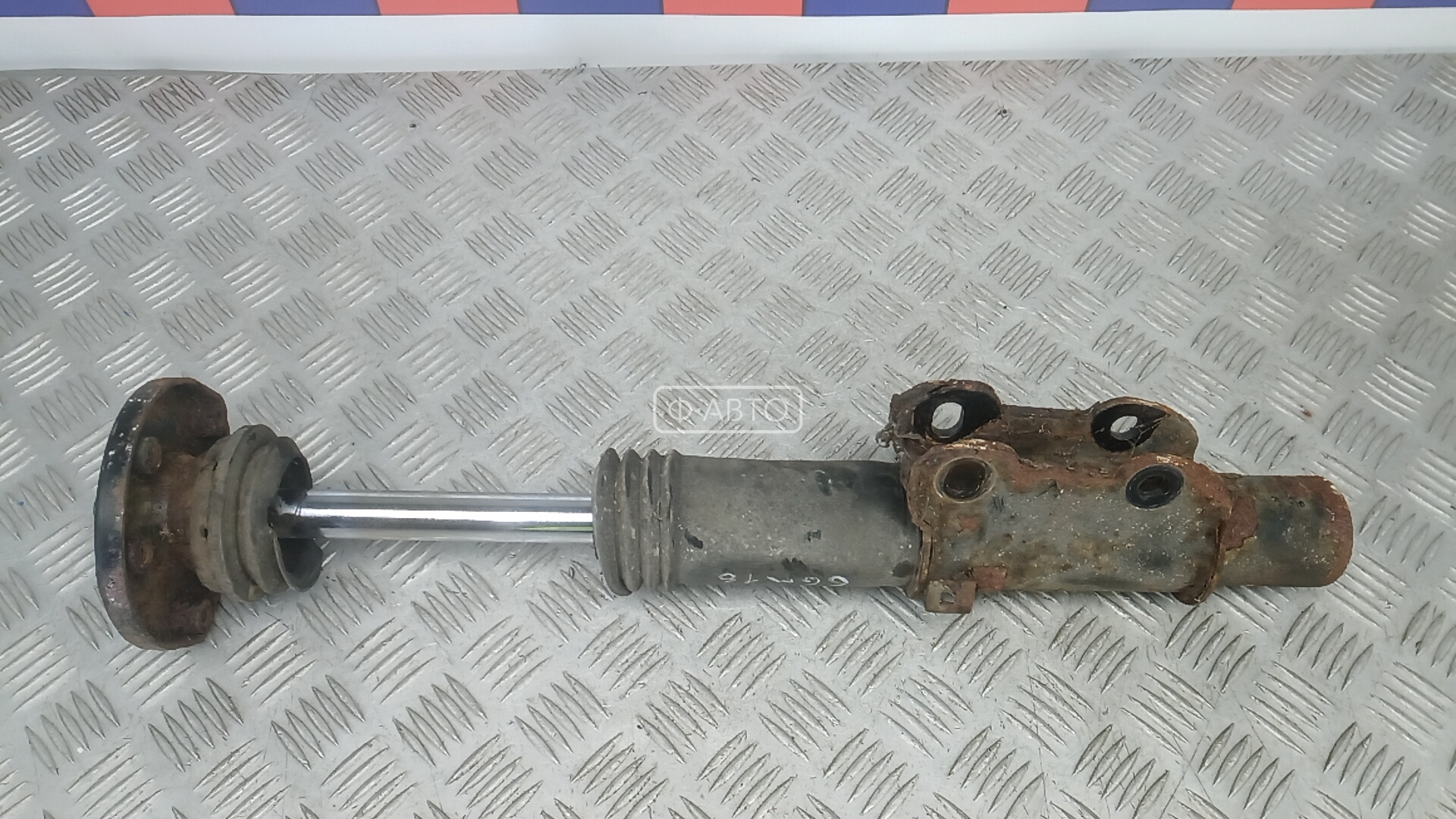 Амортизатор передний левый