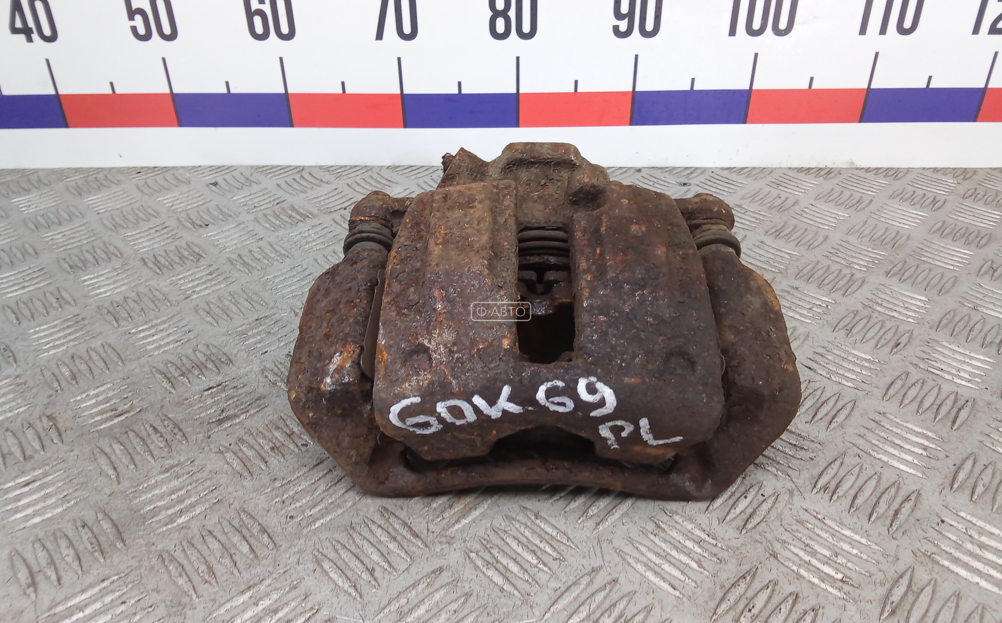 Суппорт тормозной передний левый