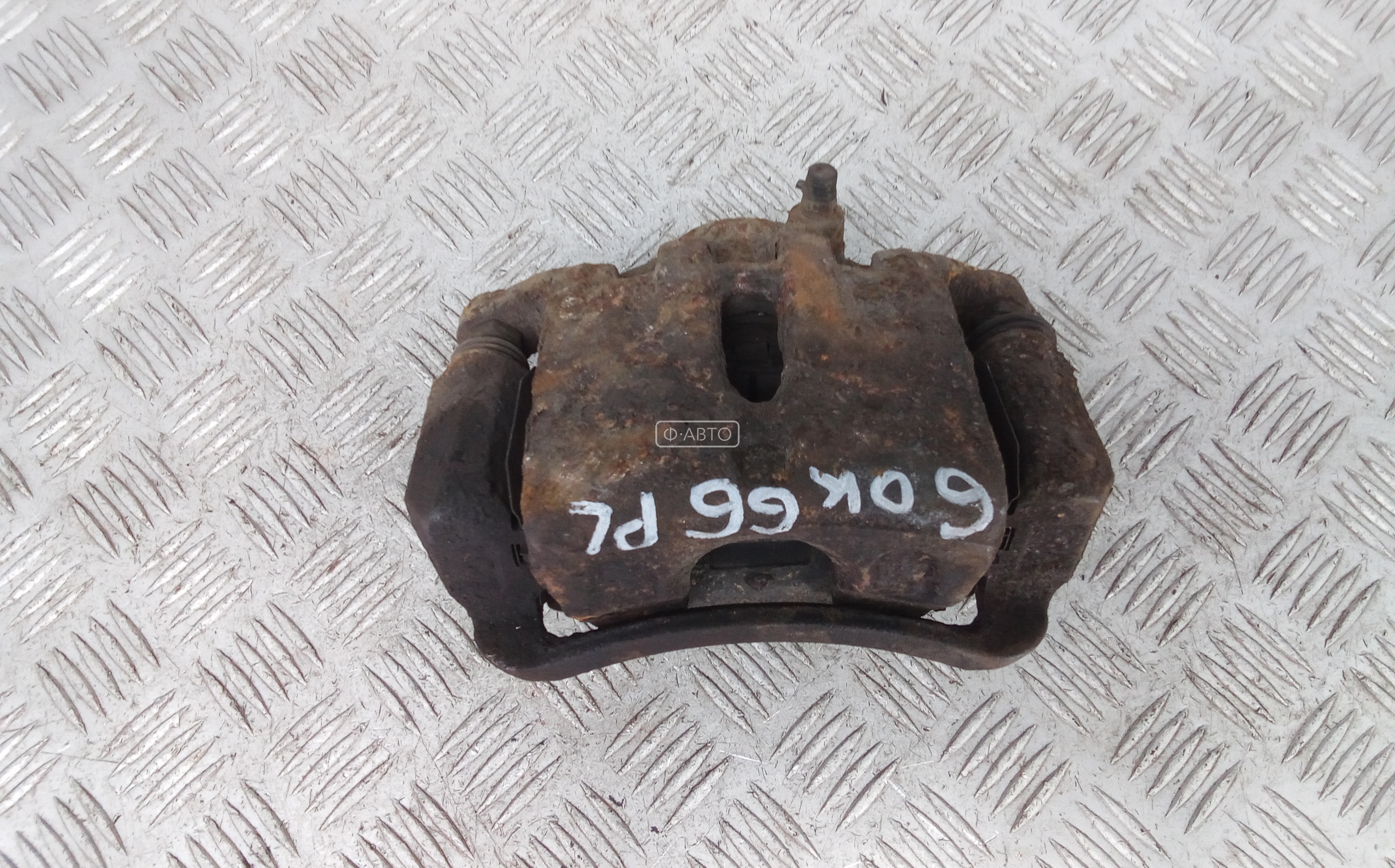 Суппорт тормозной передний левый