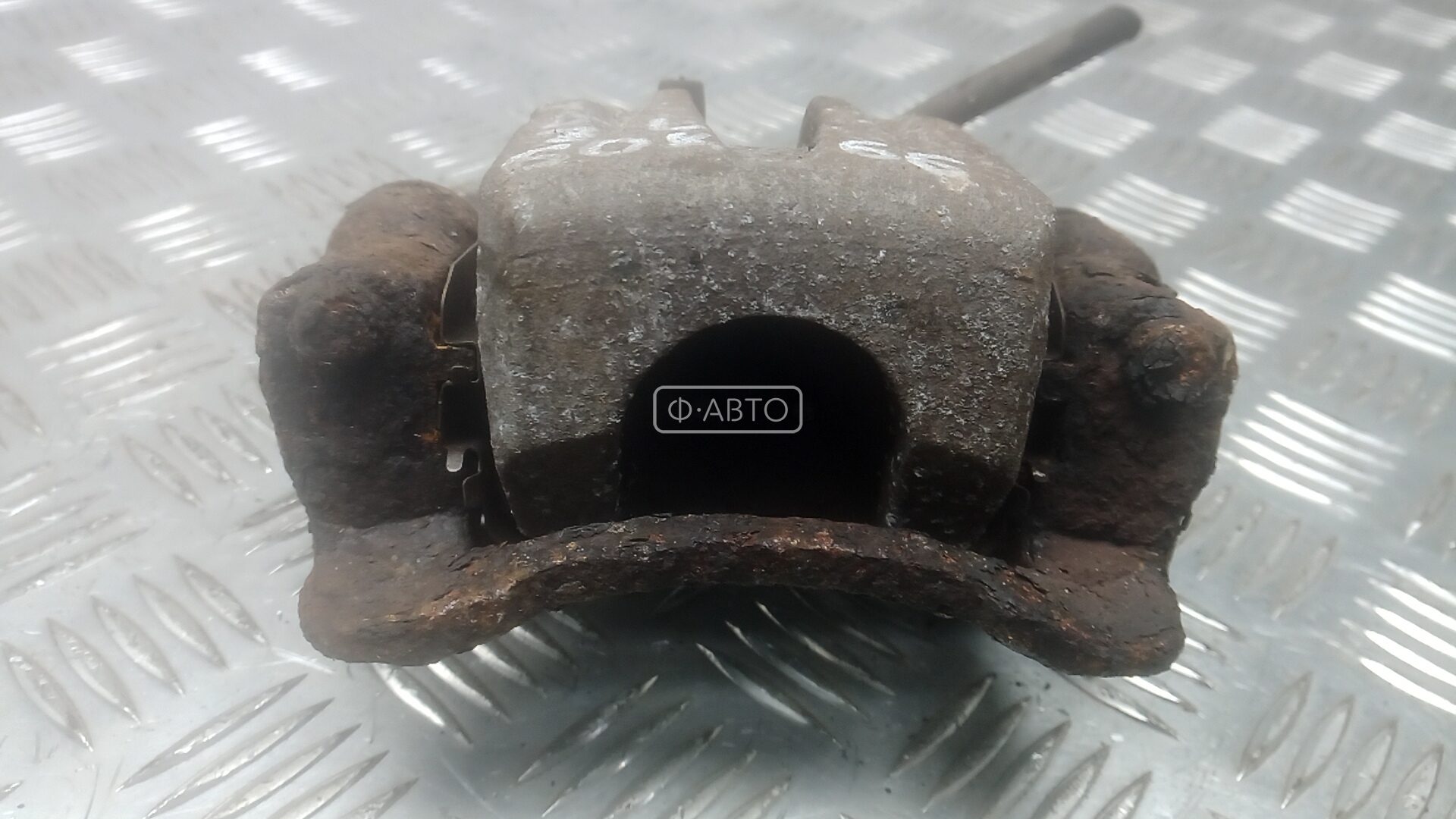 Суппорт тормозной задний левый