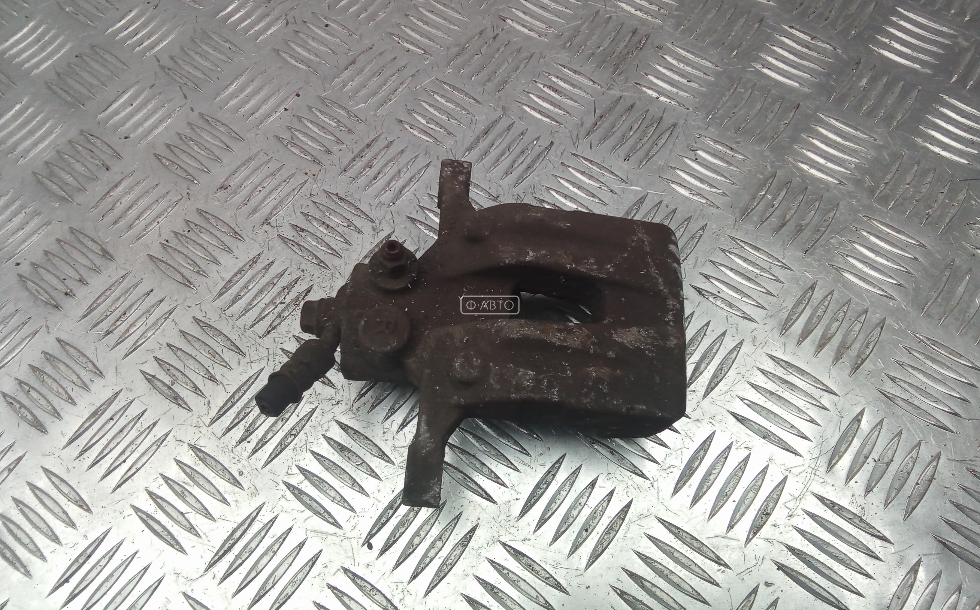 Суппорт тормозной задний правый