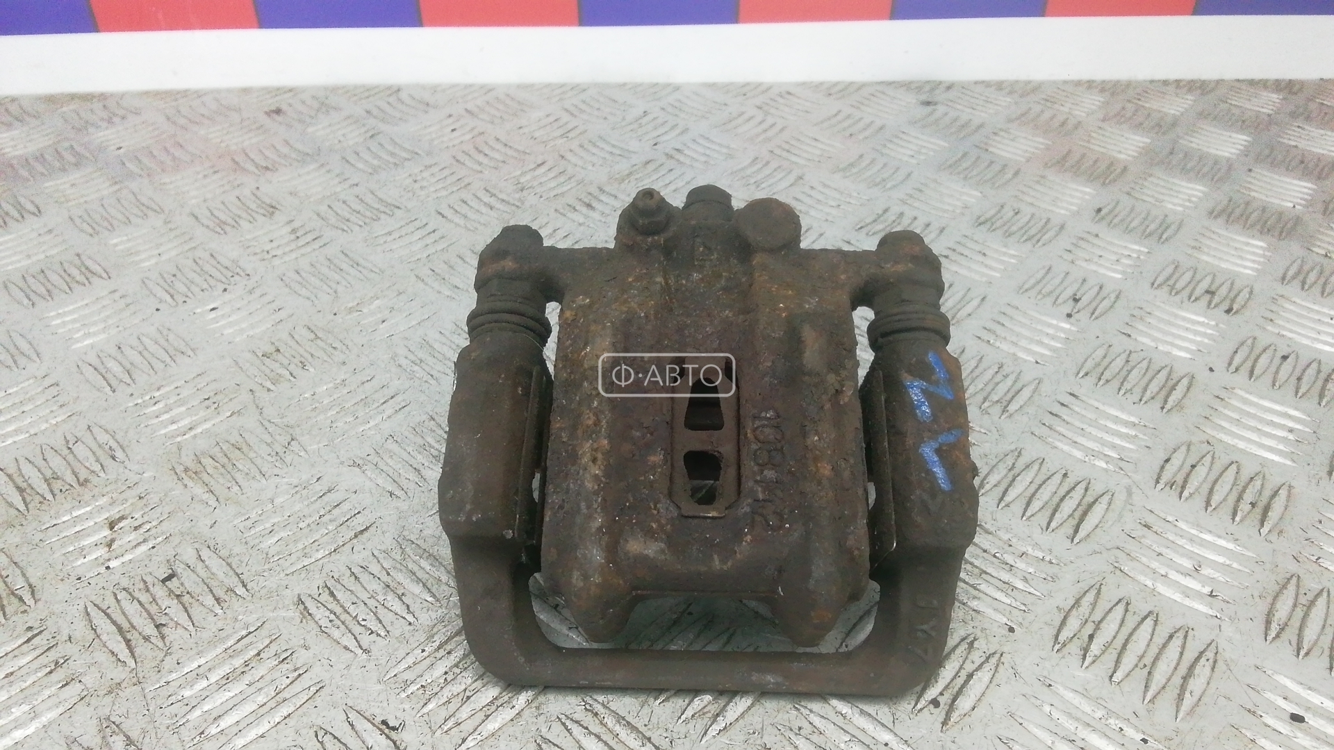 Суппорт тормозной задний левый