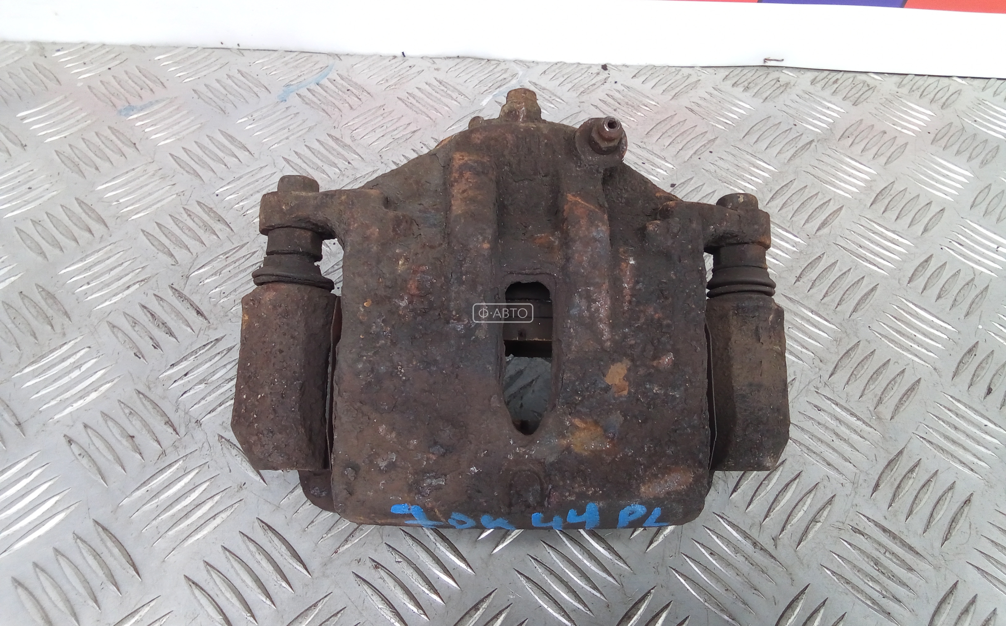 Суппорт тормозной передний левый