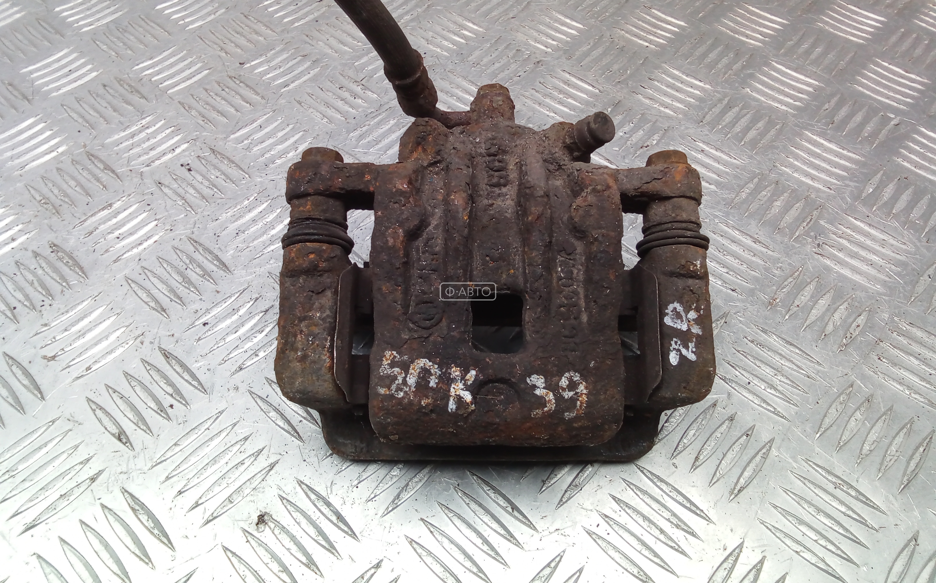 Суппорт тормозной задний правый