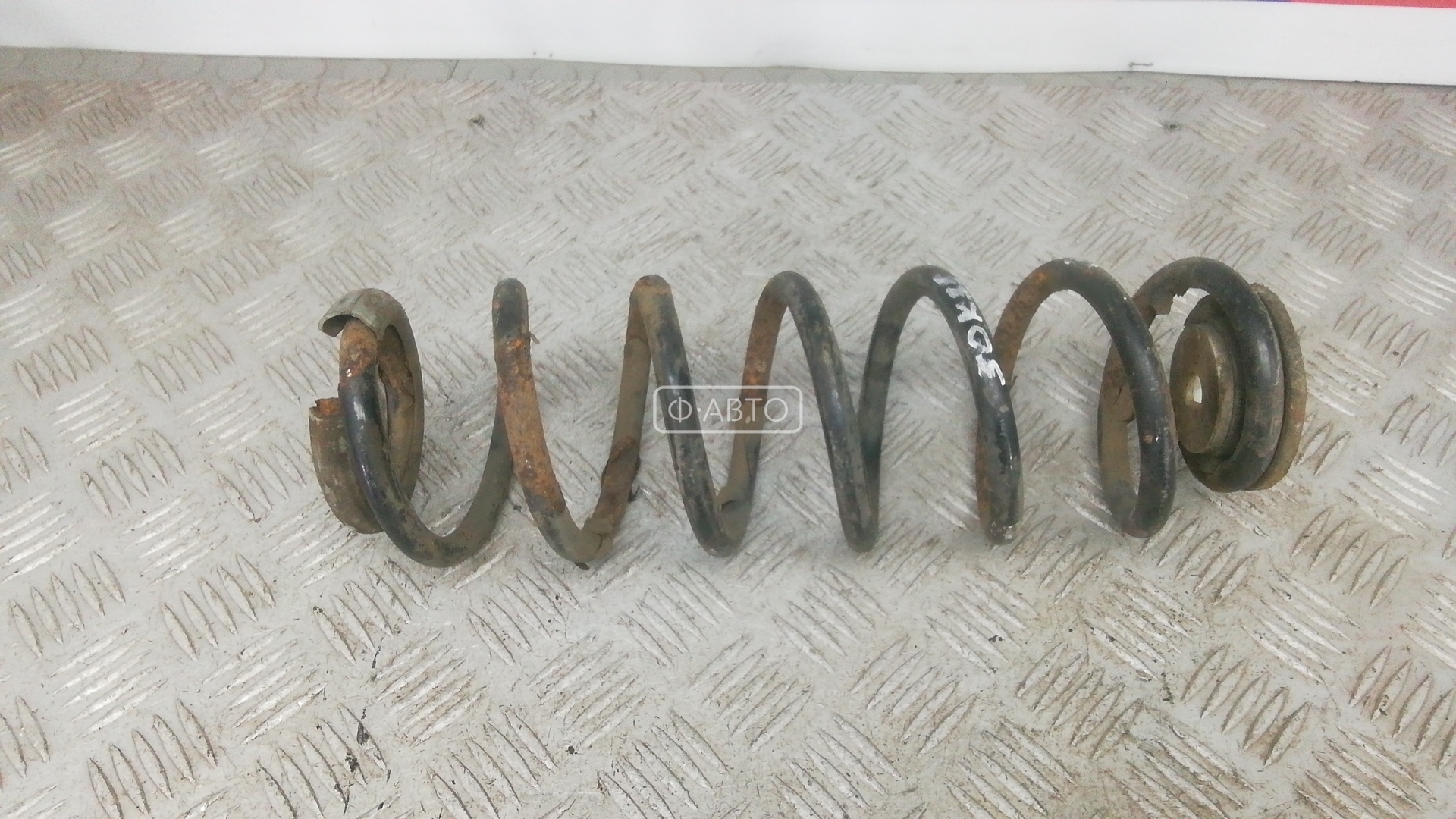 Пружина задняя