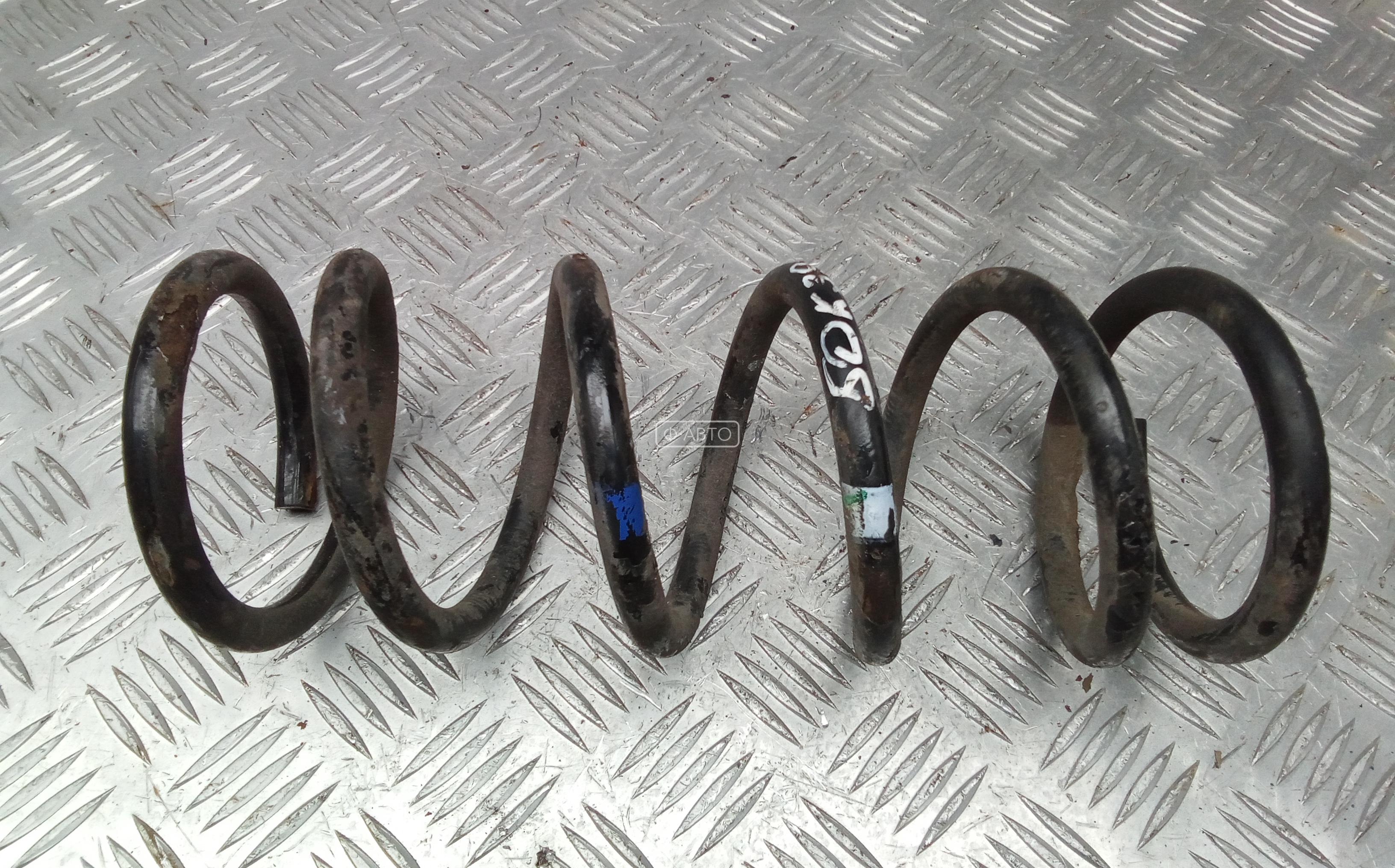 Пружина задняя