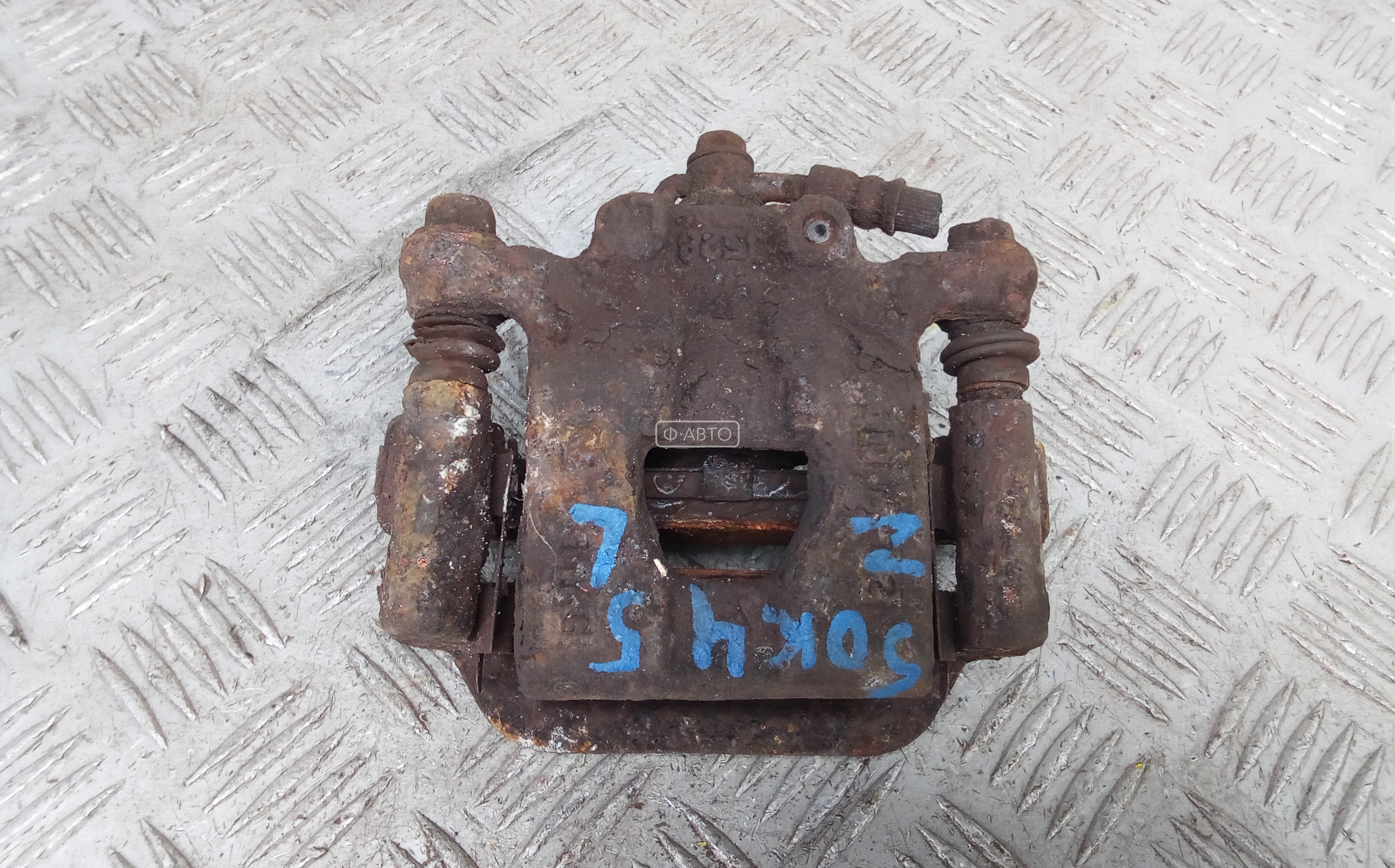 Суппорт тормозной задний левый