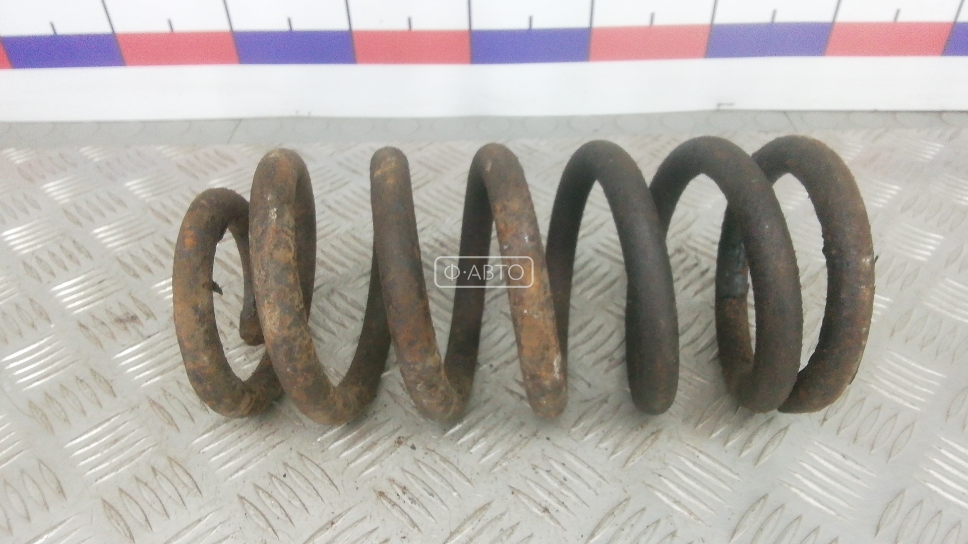 Пружина задняя