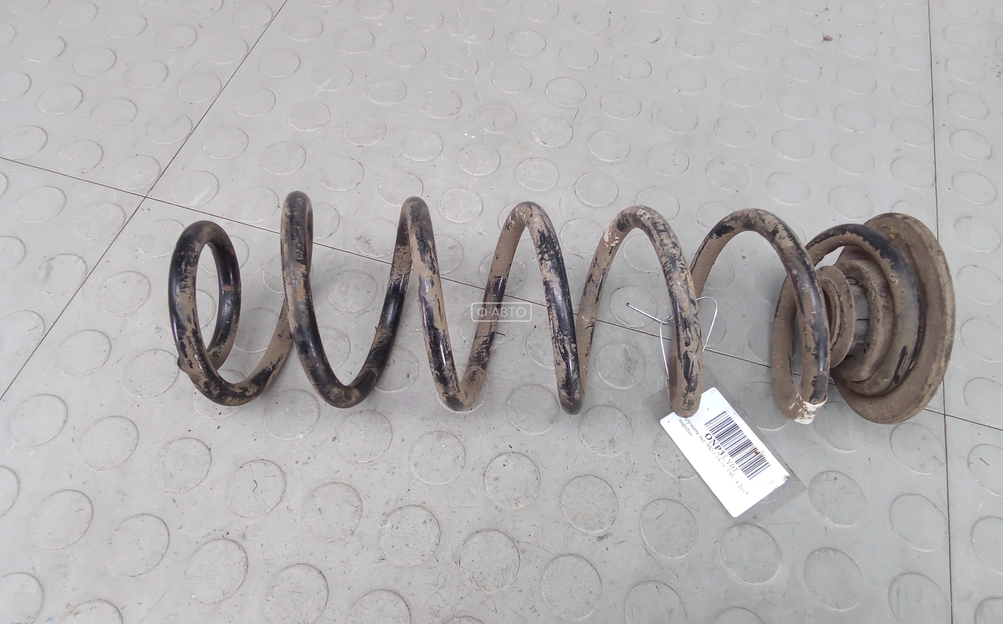 Пружина задняя