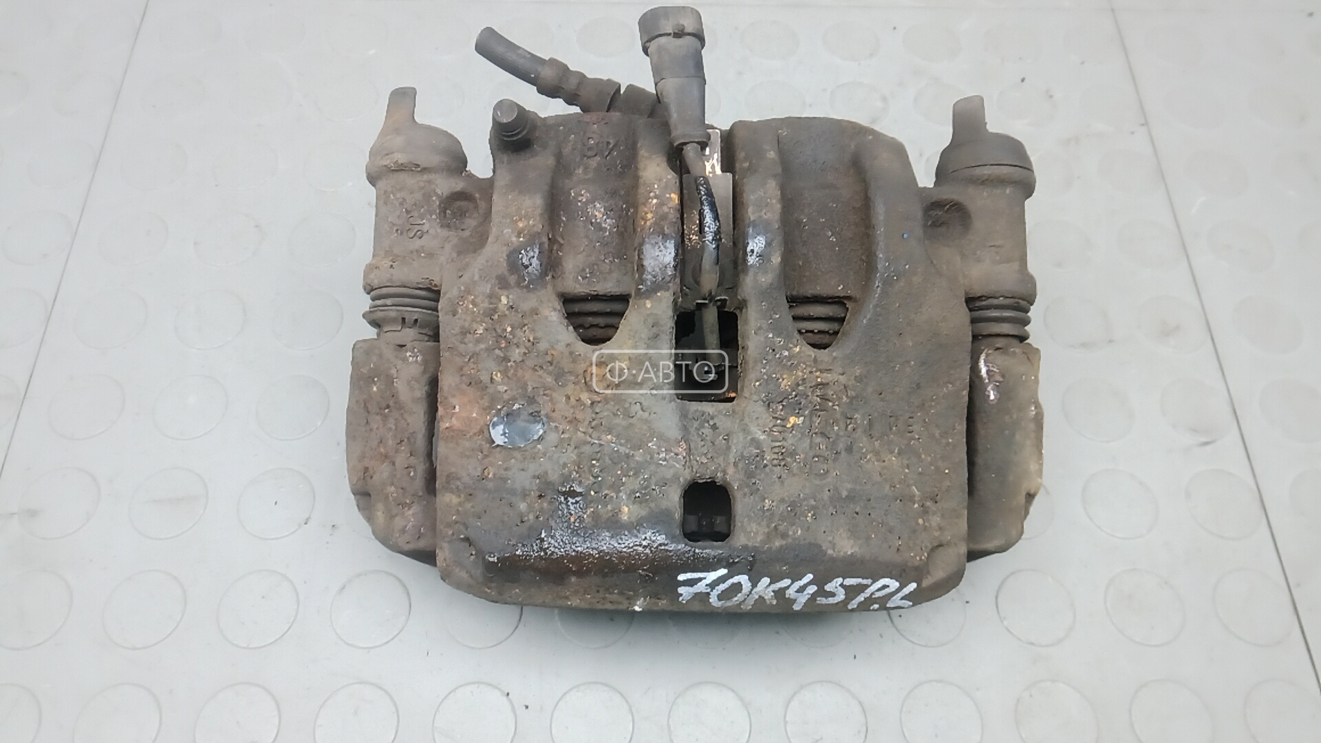 Суппорт тормозной передний левый